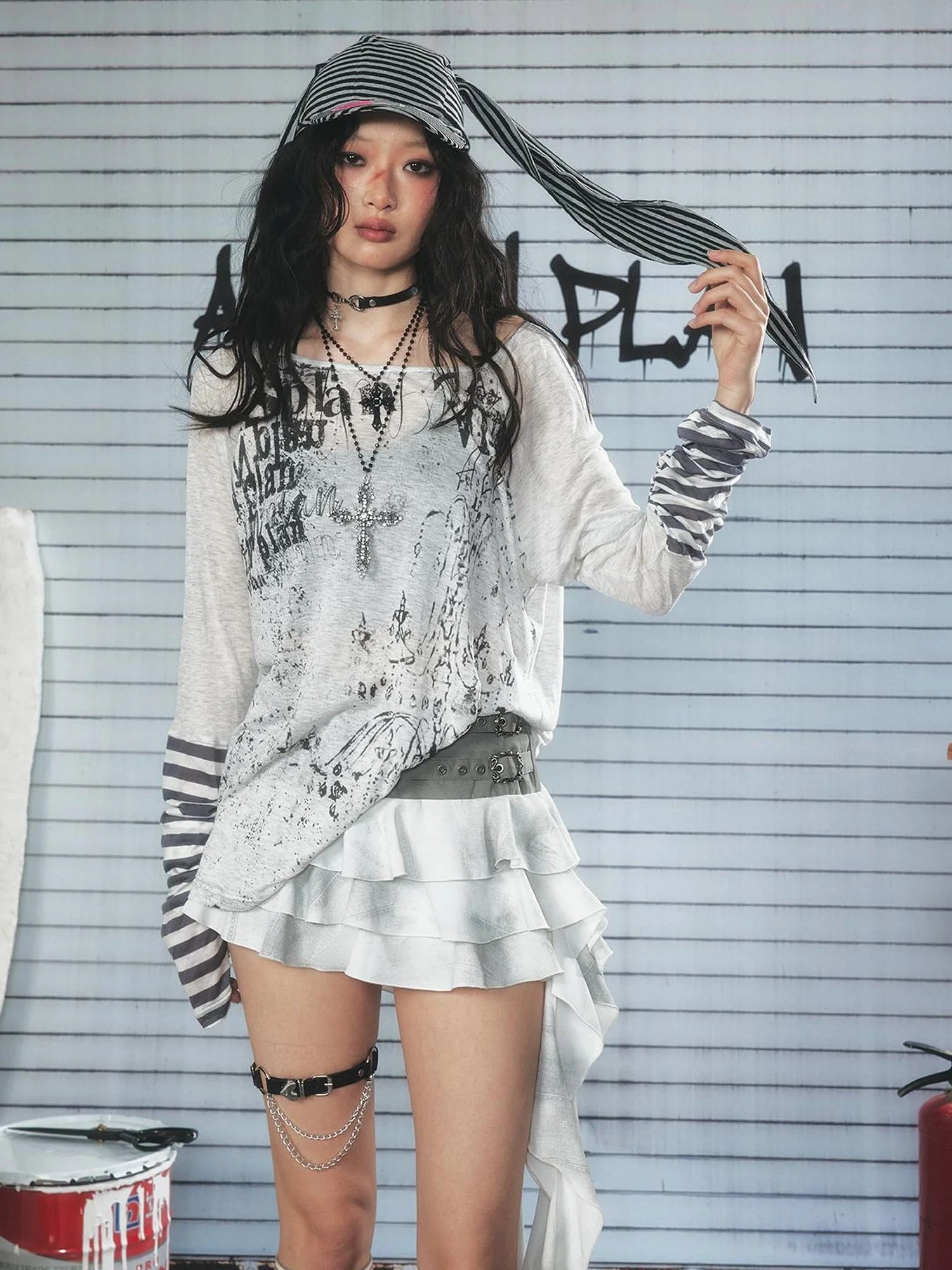 Long Sleeve Graphic Tee with Graffiti Print and Striped Cuffs