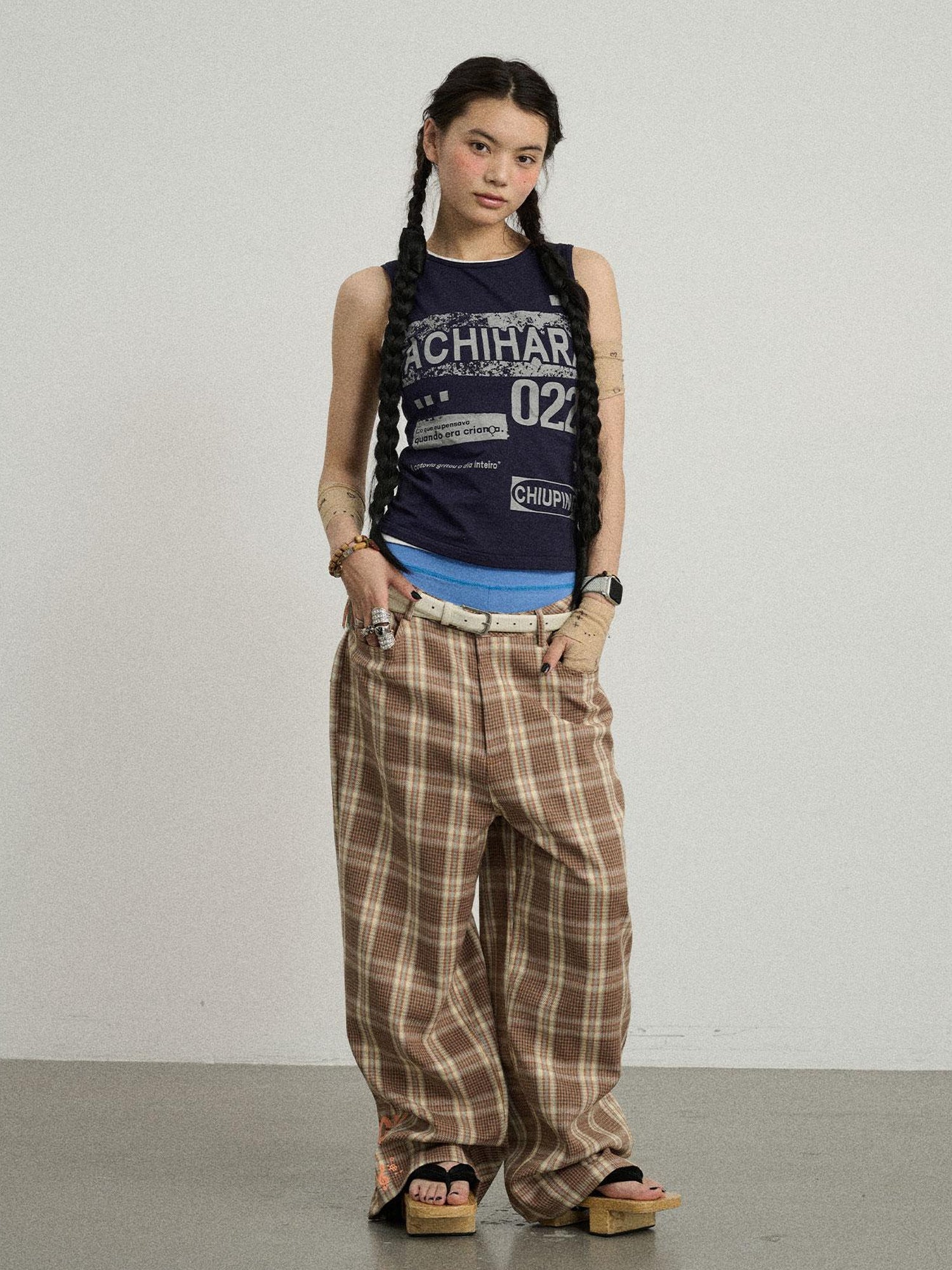 Achihara Mosaic Checkered Wide Leg Trousers With Embroidered Cuffs