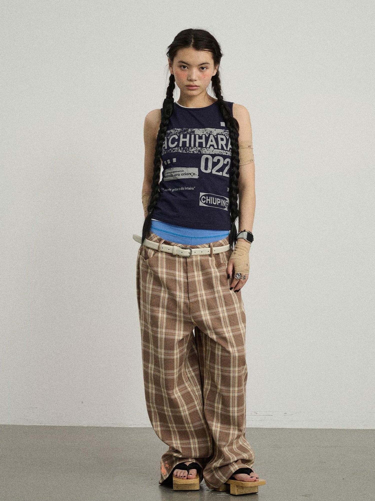Achihara Mosaic Checkered Wide Leg Trousers With Embroidered Cuffs