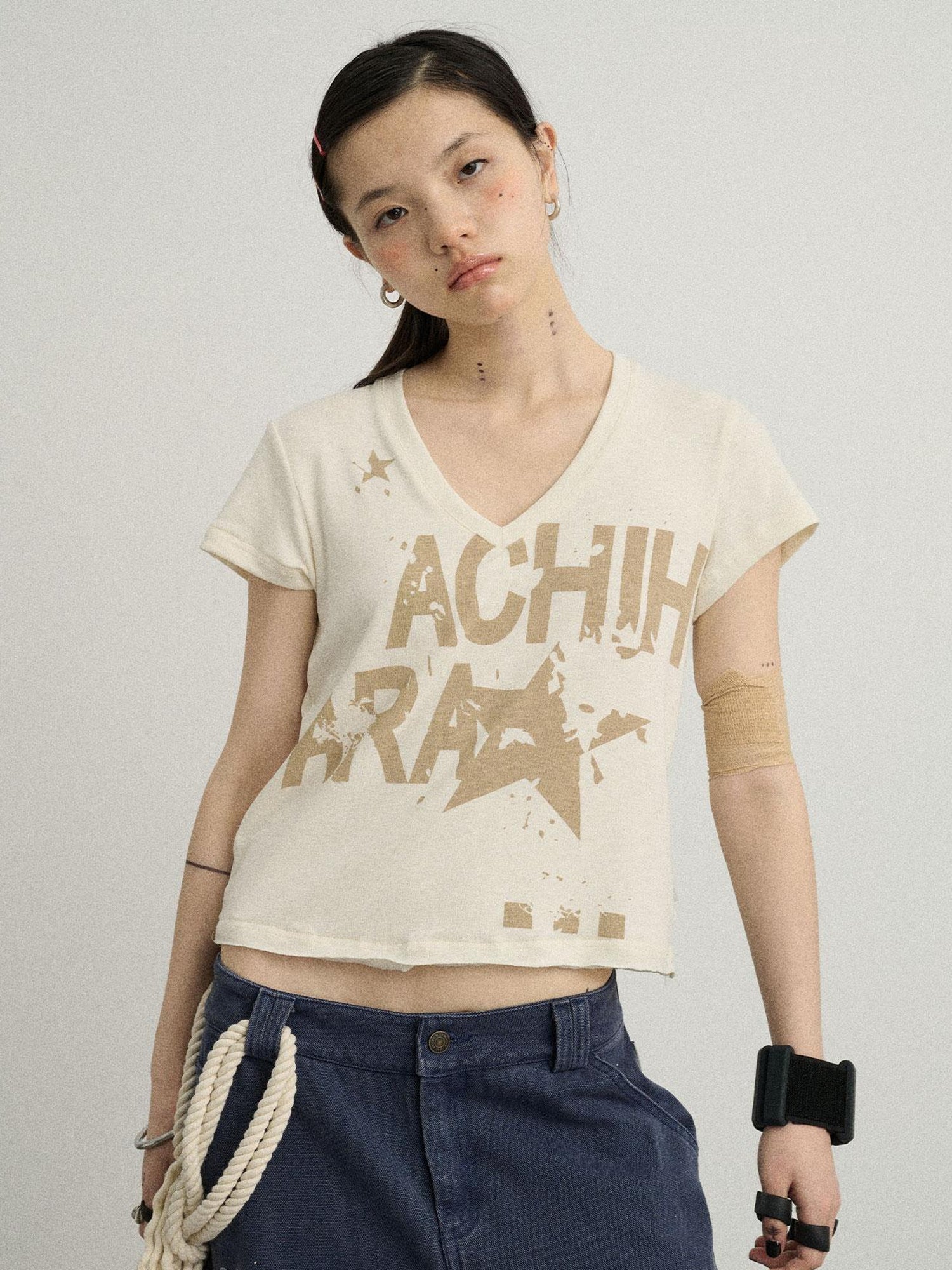Achihara V-Neck Frayed Hem Cotton Tee With Melted Fruit Print