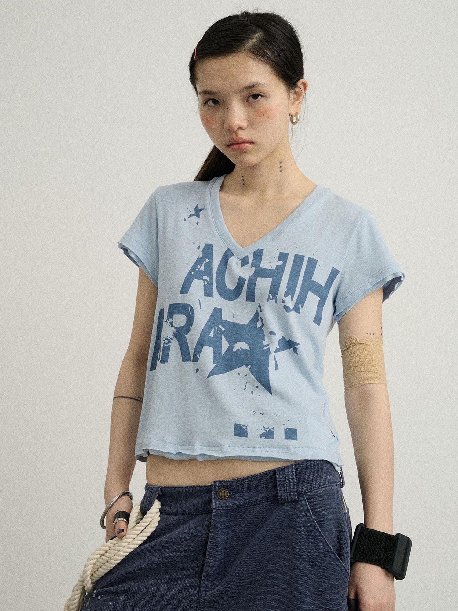 Achihara V-Neck Frayed Hem Cotton Tee With Melted Fruit Print