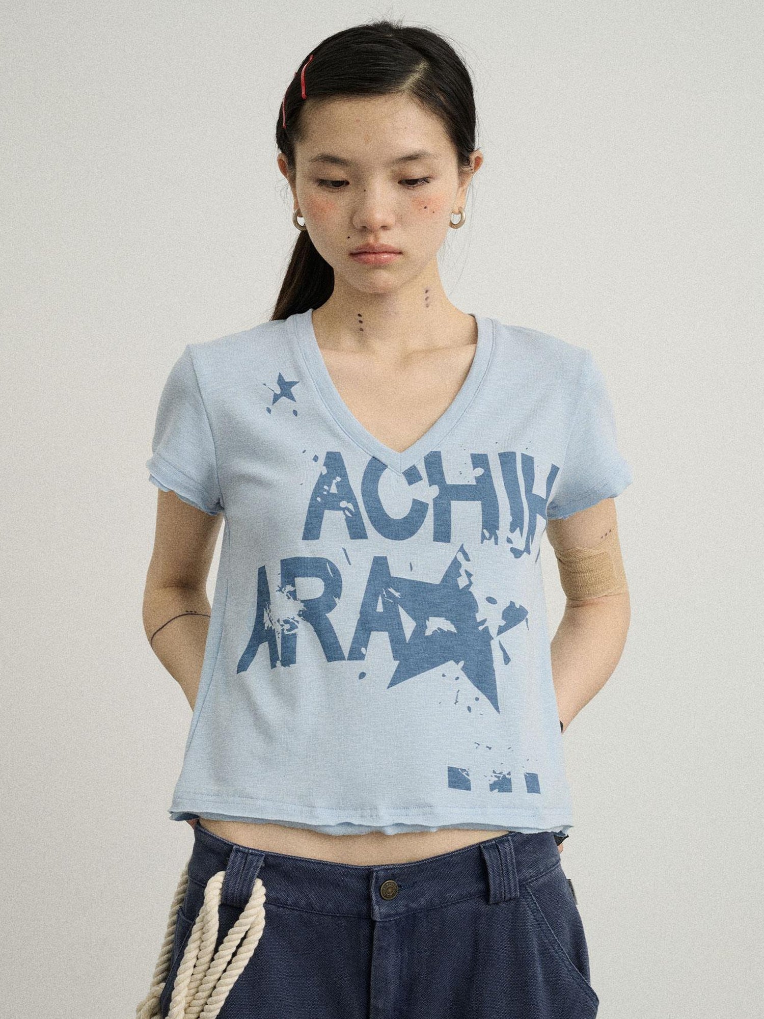 Achihara V-Neck Frayed Hem Cotton Tee With Melted Fruit Print