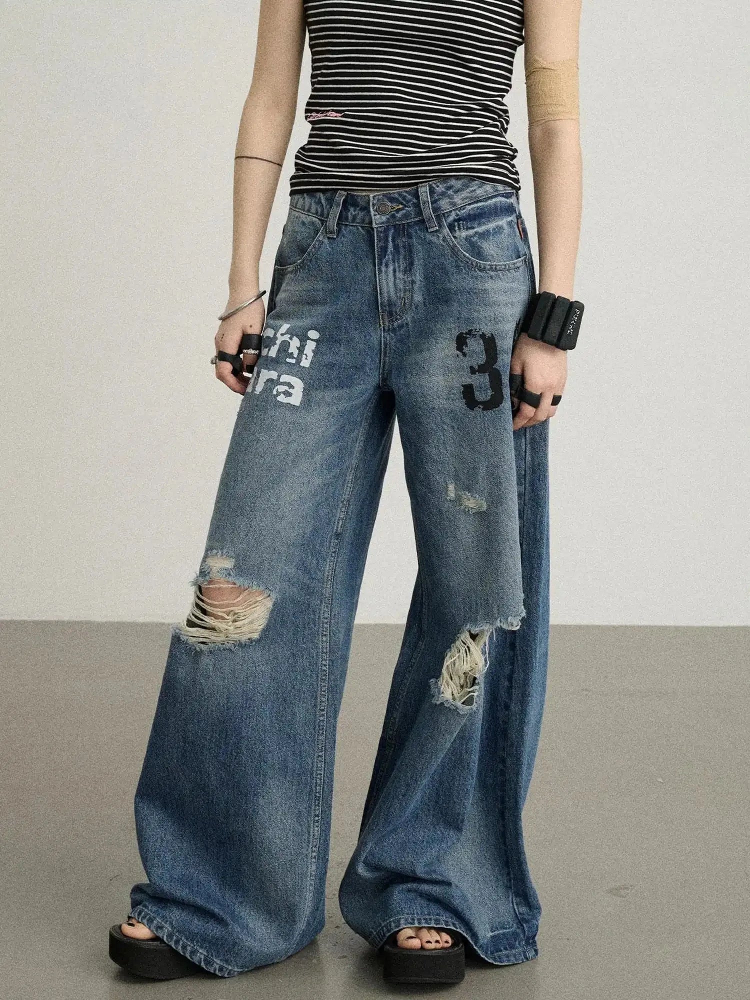 Vintage Washed Wide Leg Jeans With Distressed Details