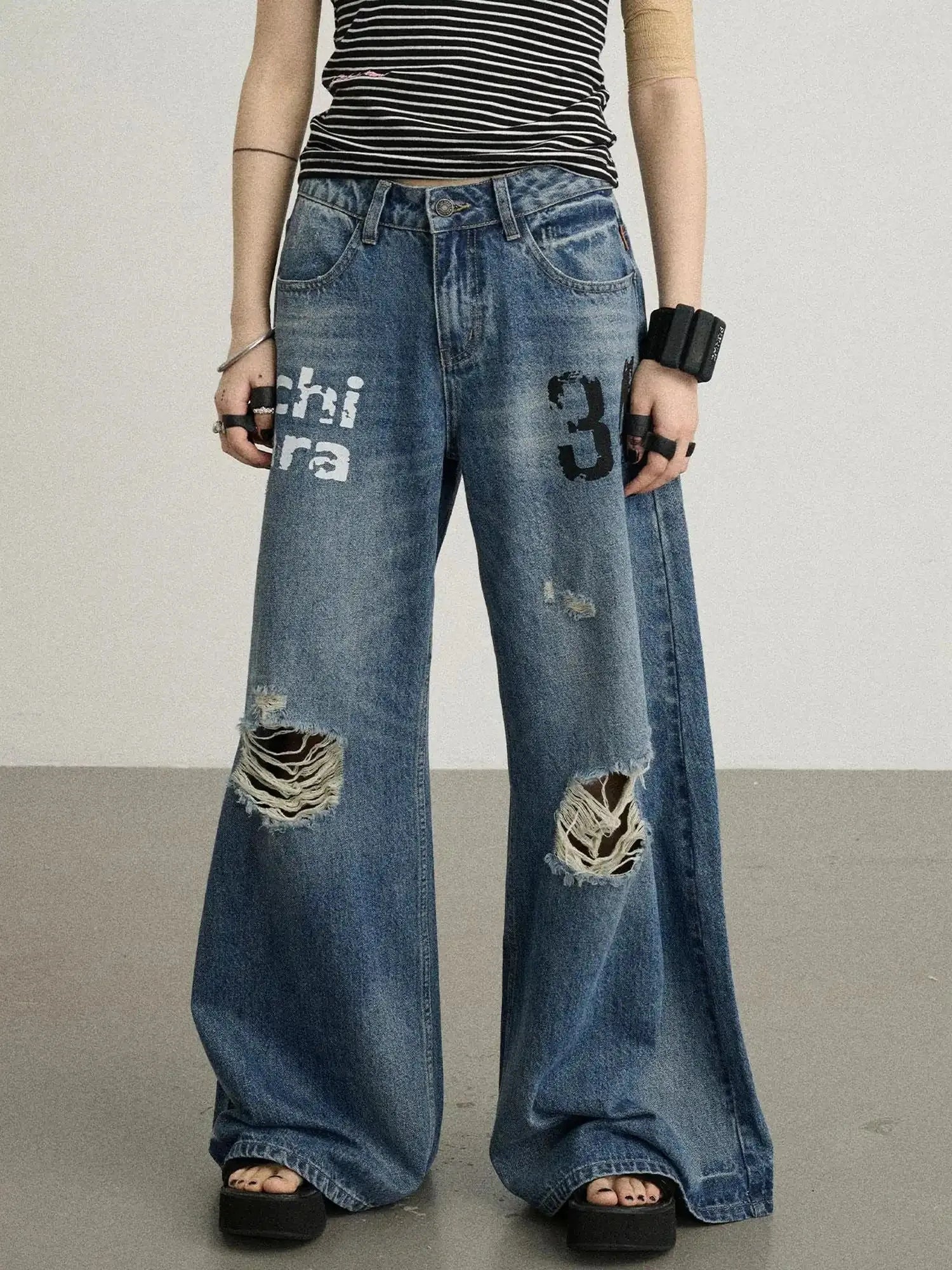 Vintage Washed Wide Leg Jeans With Distressed Details