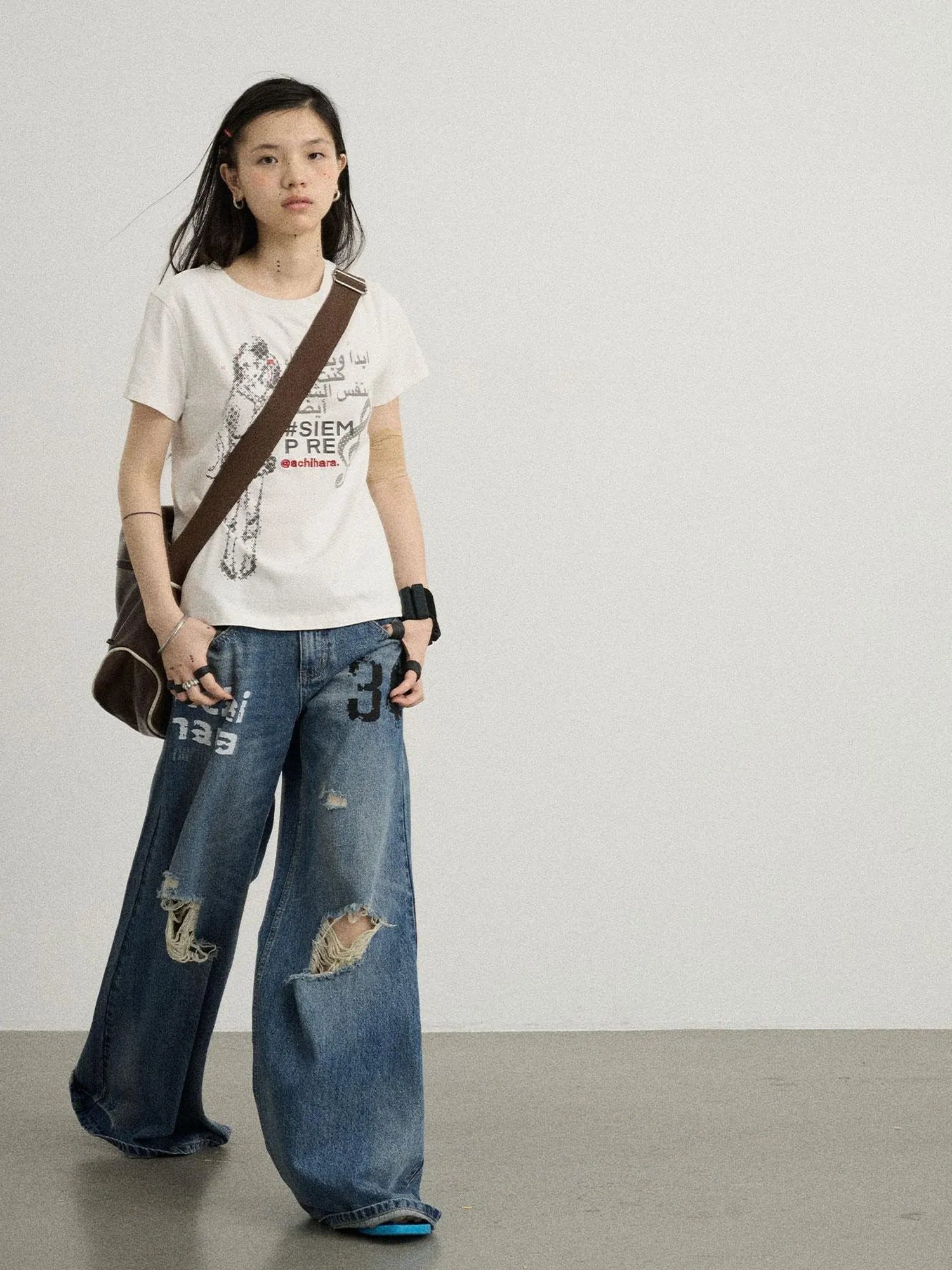 Vintage Washed Wide Leg Jeans With Distressed Details