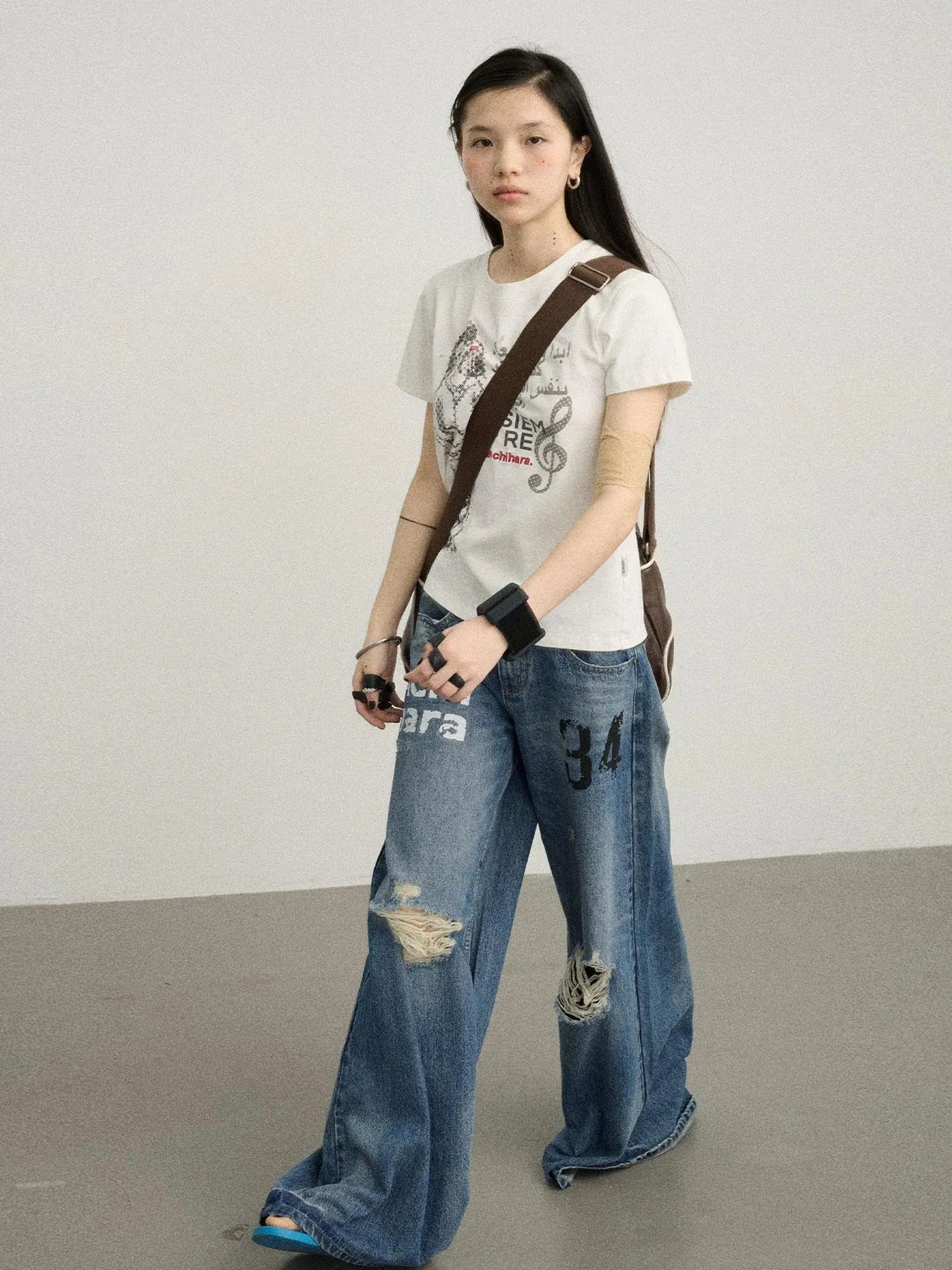 Vintage Washed Wide Leg Jeans With Distressed Details