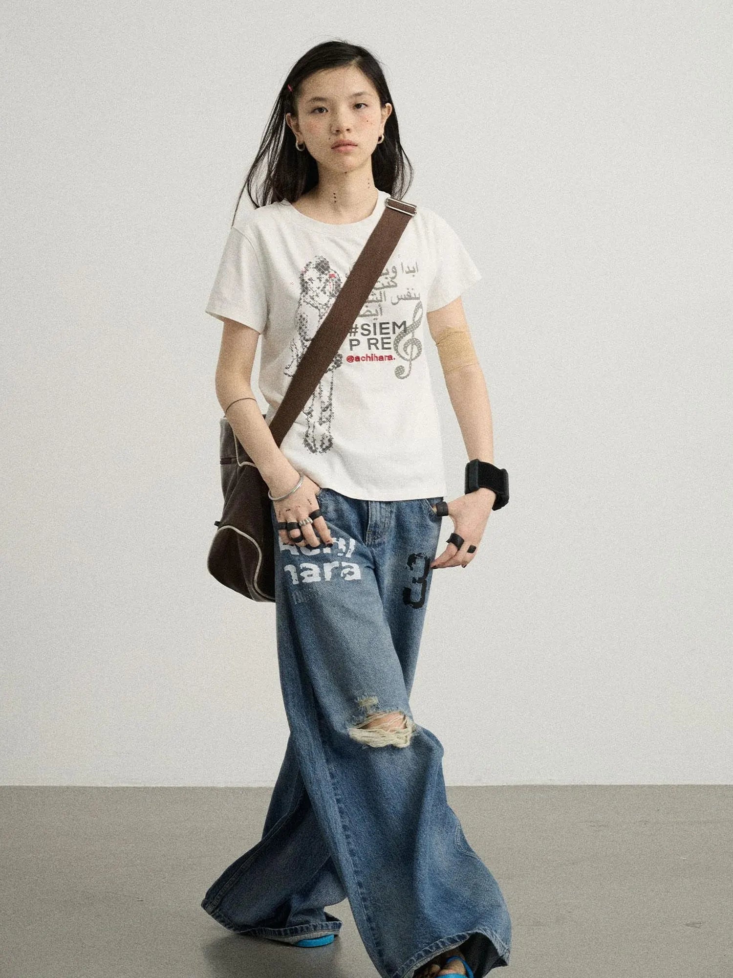 Vintage Washed Wide Leg Jeans With Distressed Details