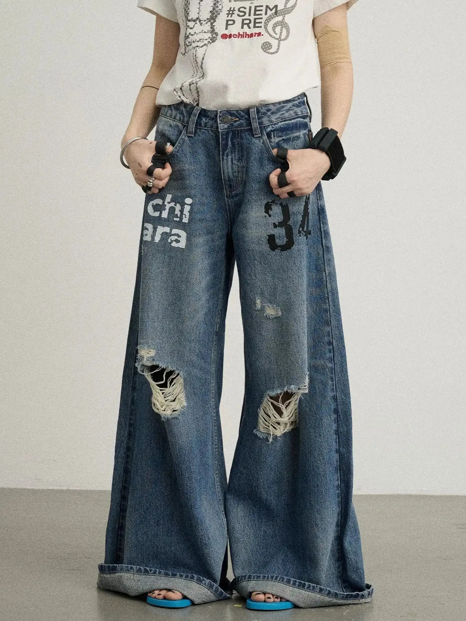 Vintage Washed Wide Leg Jeans With Distressed Details