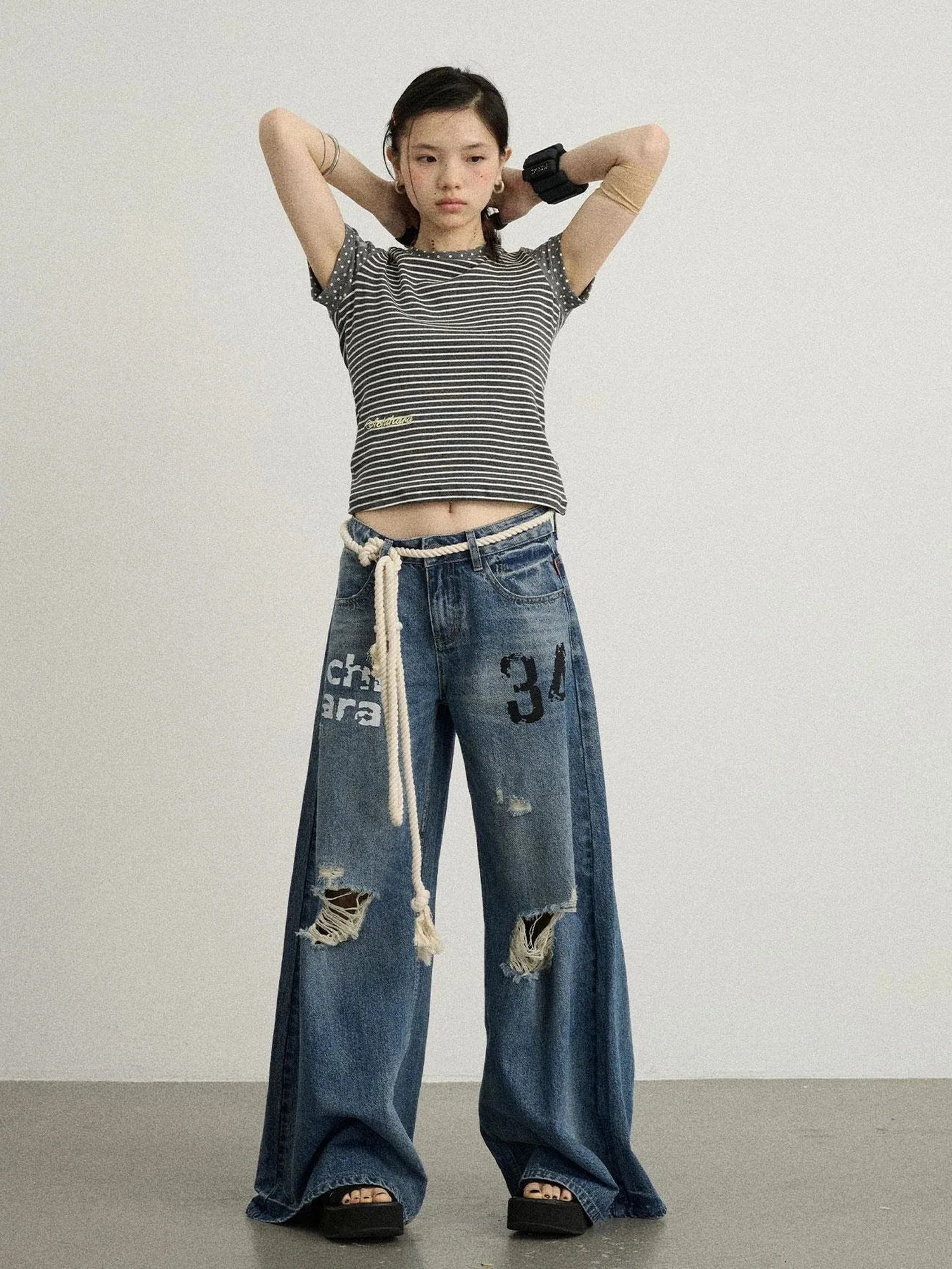 Vintage Washed Wide Leg Jeans With Distressed Details