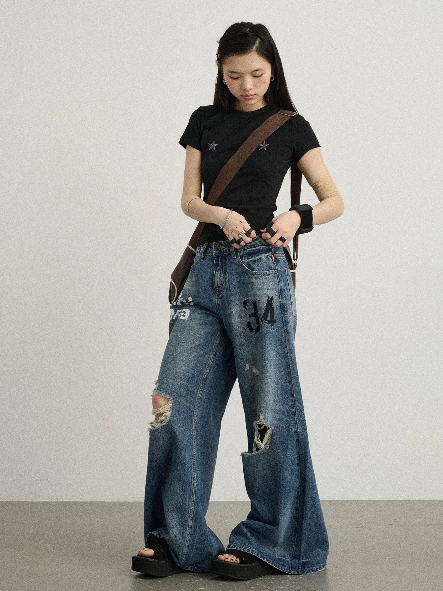 Vintage Washed Wide Leg Jeans With Distressed Details