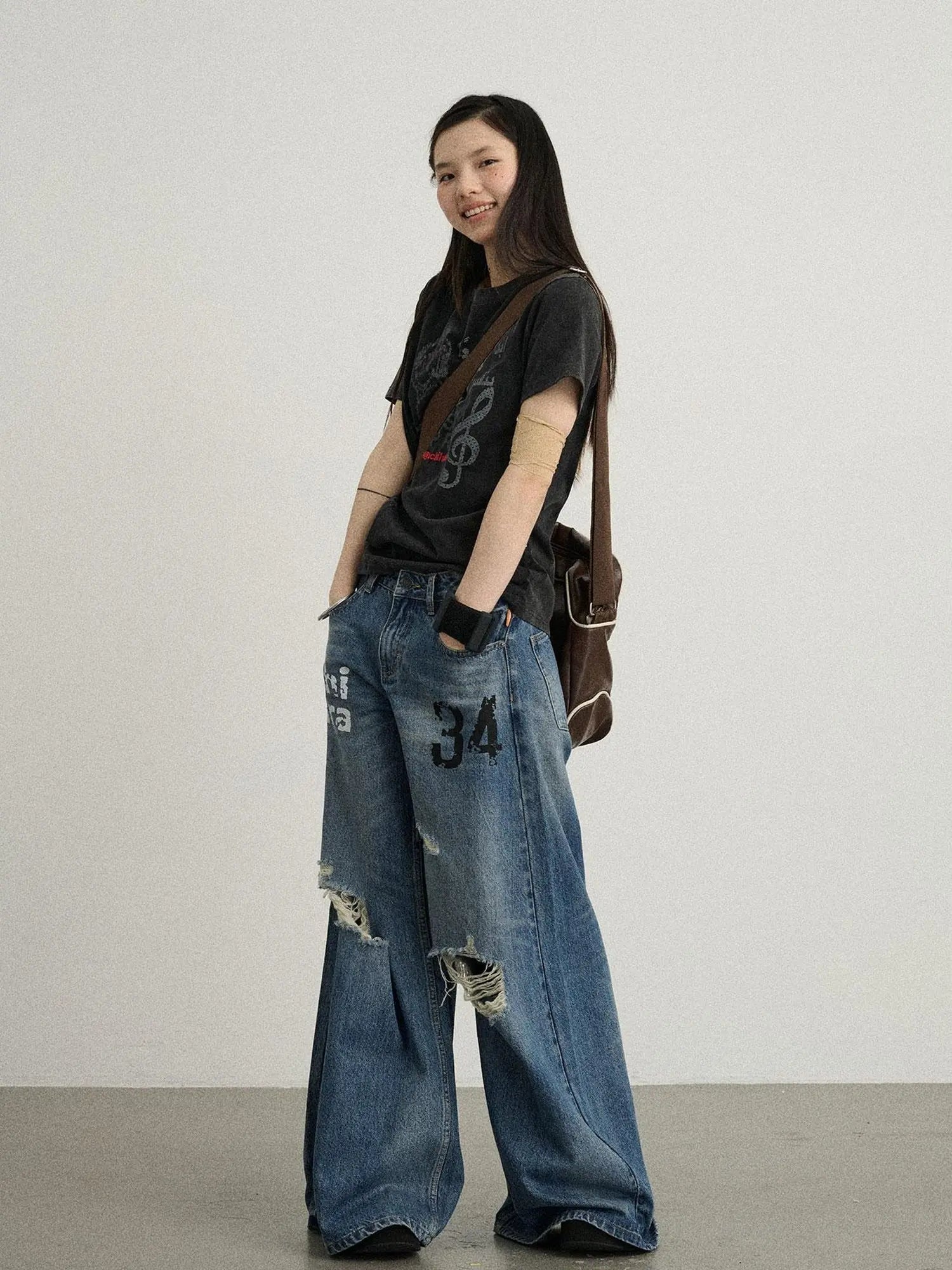 Vintage Washed Wide Leg Jeans With Distressed Details