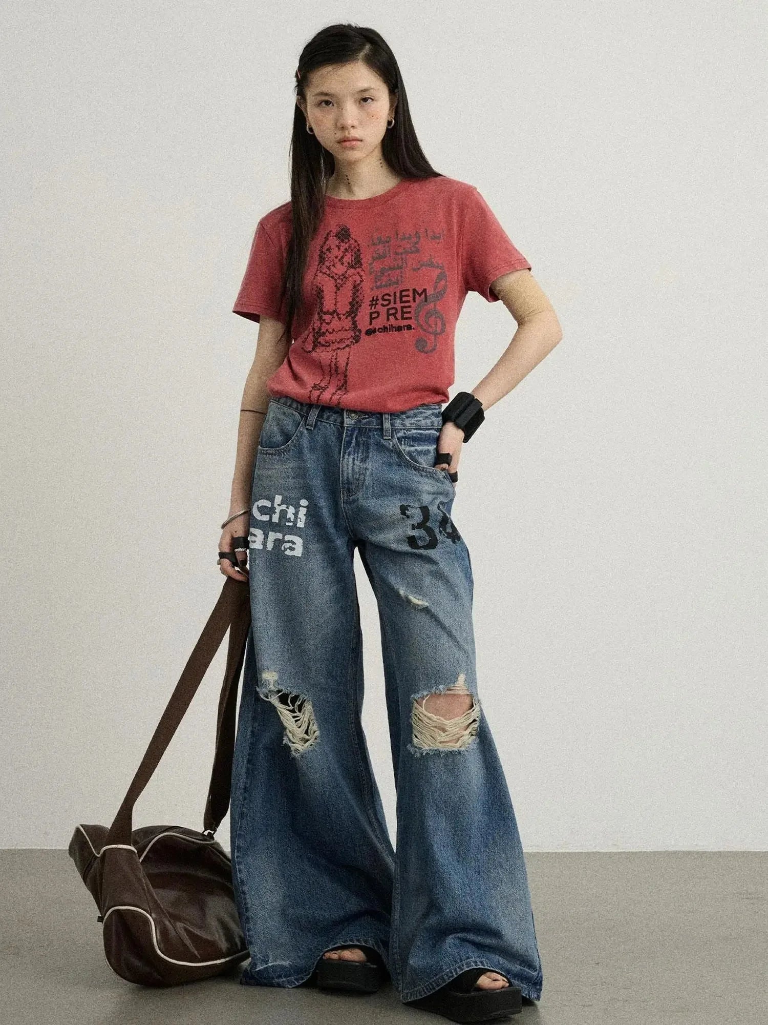 Vintage Washed Wide Leg Jeans With Distressed Details