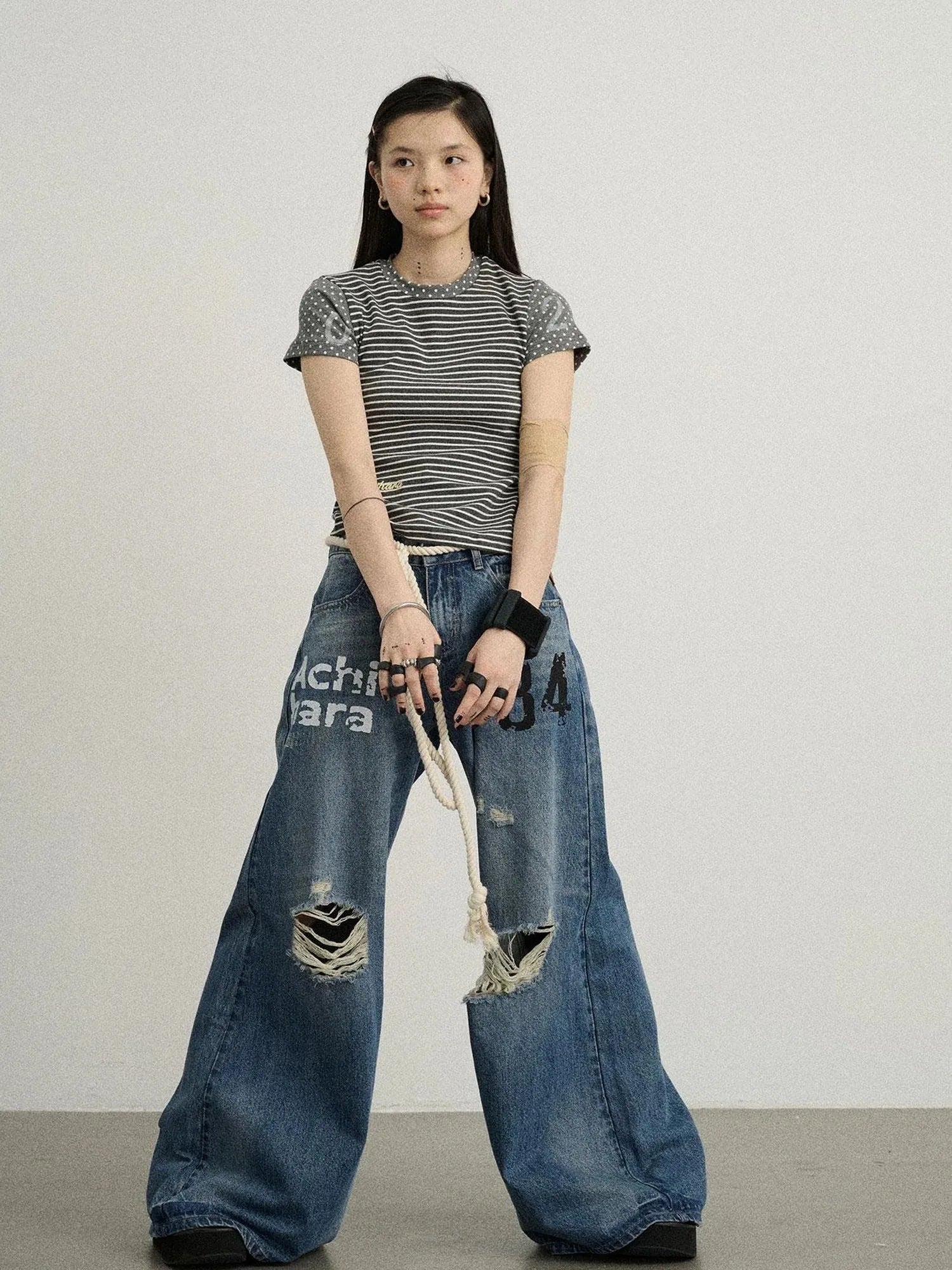 Vintage Washed Wide Leg Jeans With Distressed Details