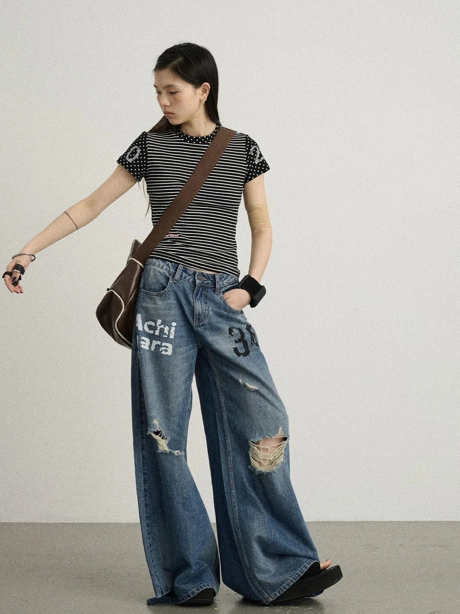 Vintage Washed Wide Leg Jeans With Distressed Details