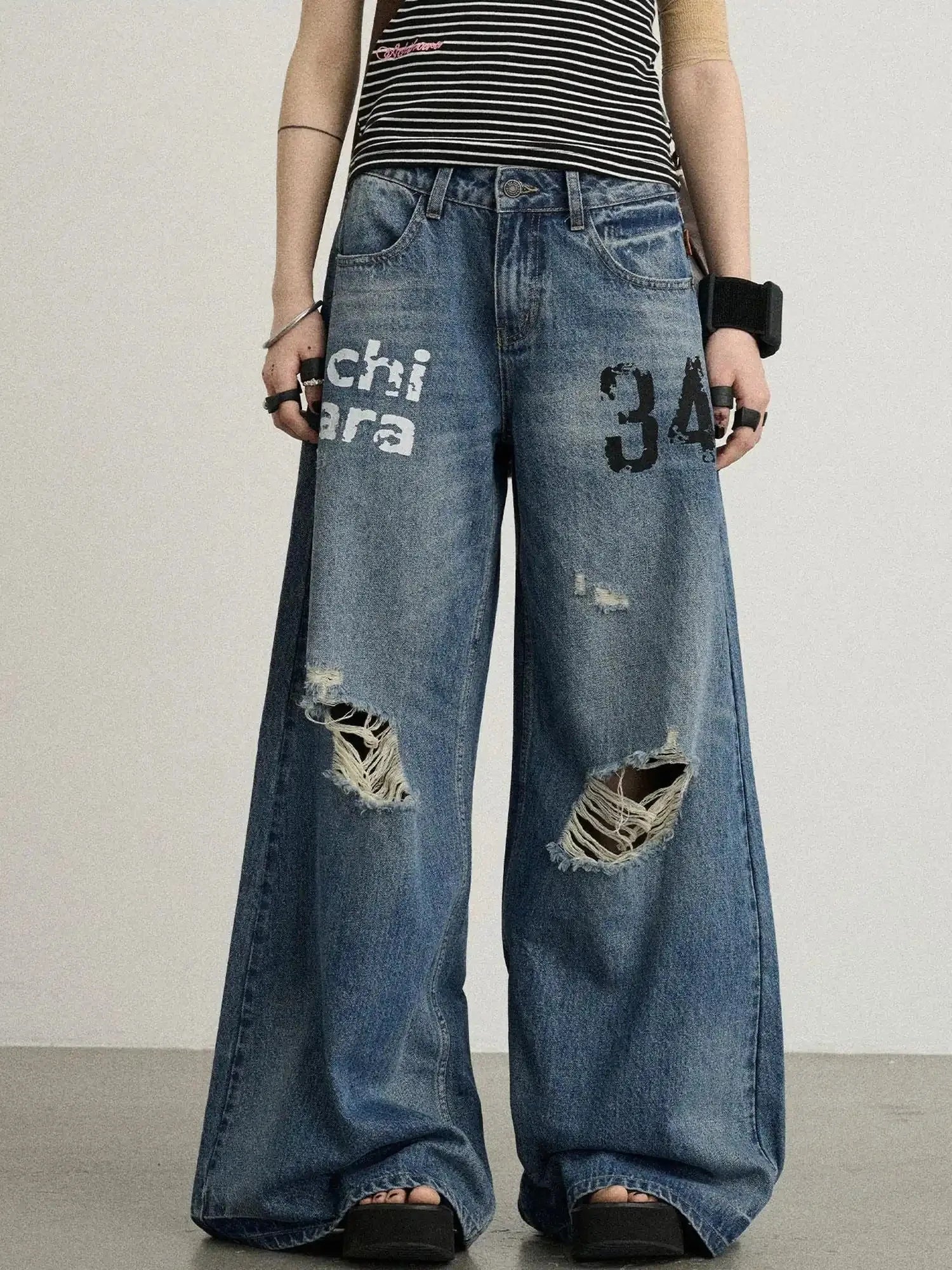 Vintage Washed Wide Leg Jeans With Distressed Details
