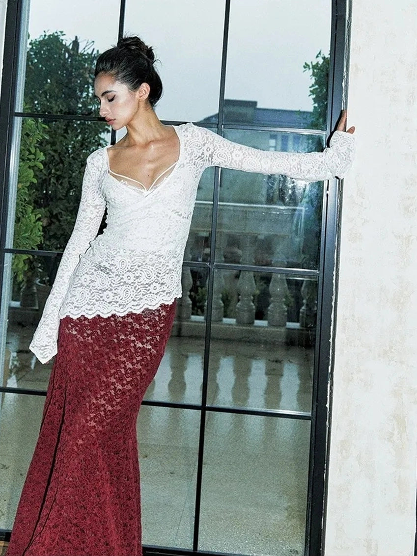 Anti Being General Rebel Lace Asymmetric Top 
V-neck 
Asymmetric Hem 
Lace Up Front 
Long Sleeve 
Cropped Length 
T-shirt Cardigan