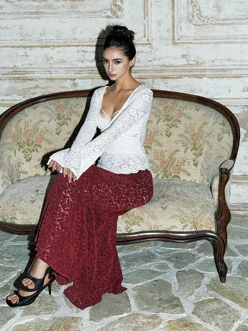 Anti Being General Rebel Lace Asymmetric Top 
V-neck 
Asymmetric Hem 
Lace Up Front 
Long Sleeve 
Cropped Length 
T-shirt Cardigan