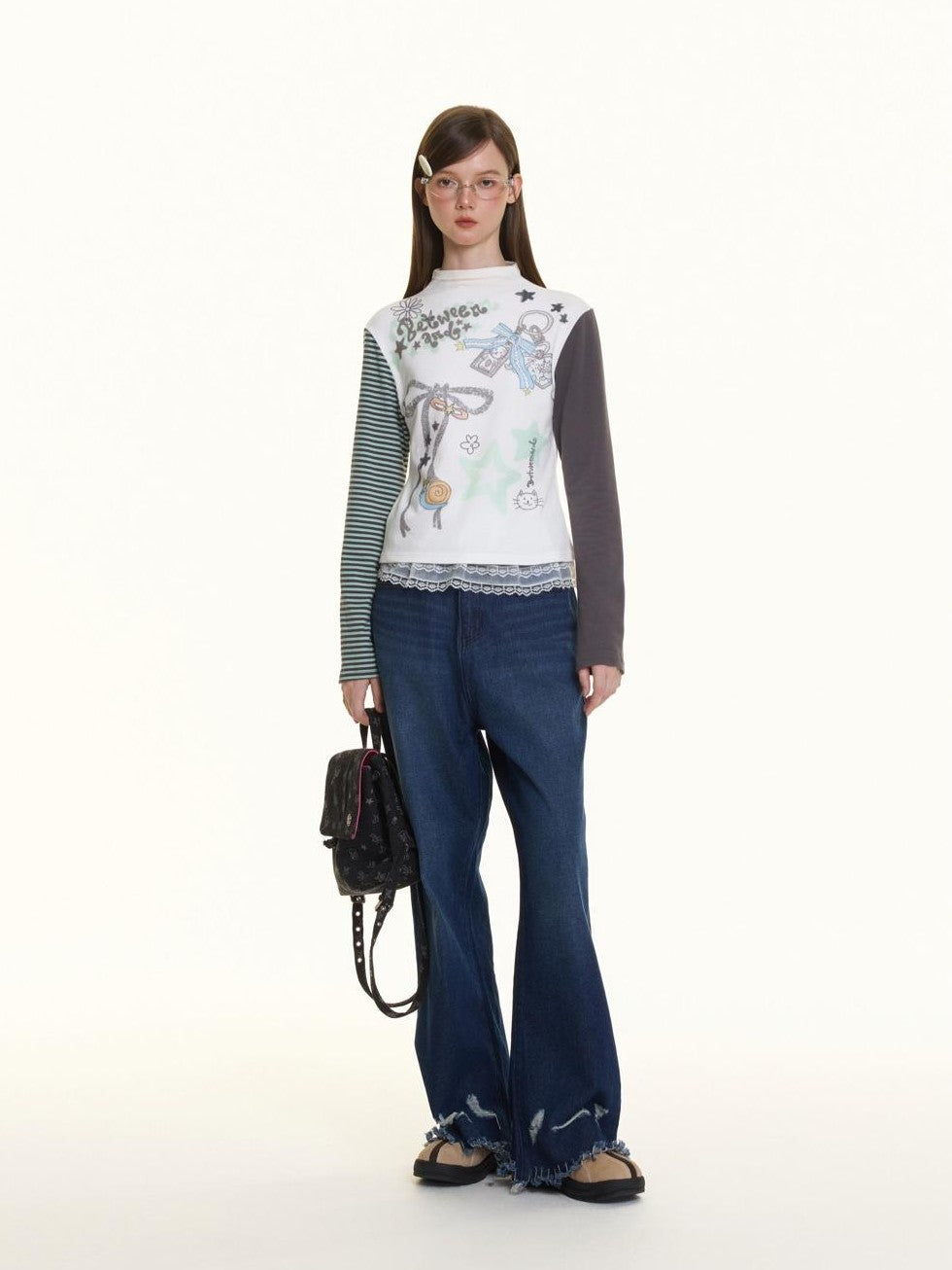 BETWEENAND Faded Wash Leg Lengthening Distressed Hem Women&