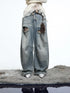 Vintage Wash Distressed Crescent Wide Leg Jeans
