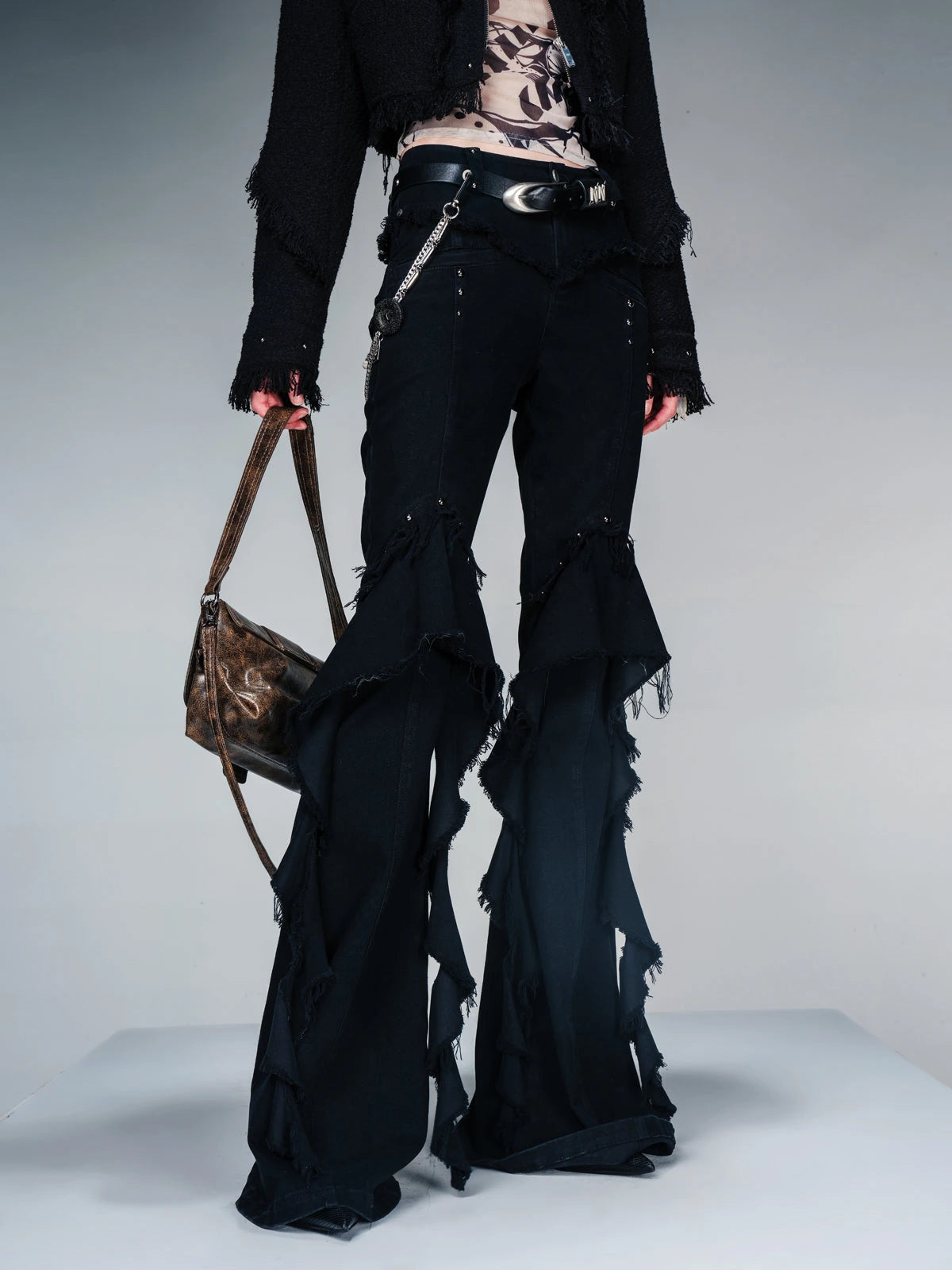 Flared Denim Pants With Asymmetrical Hem