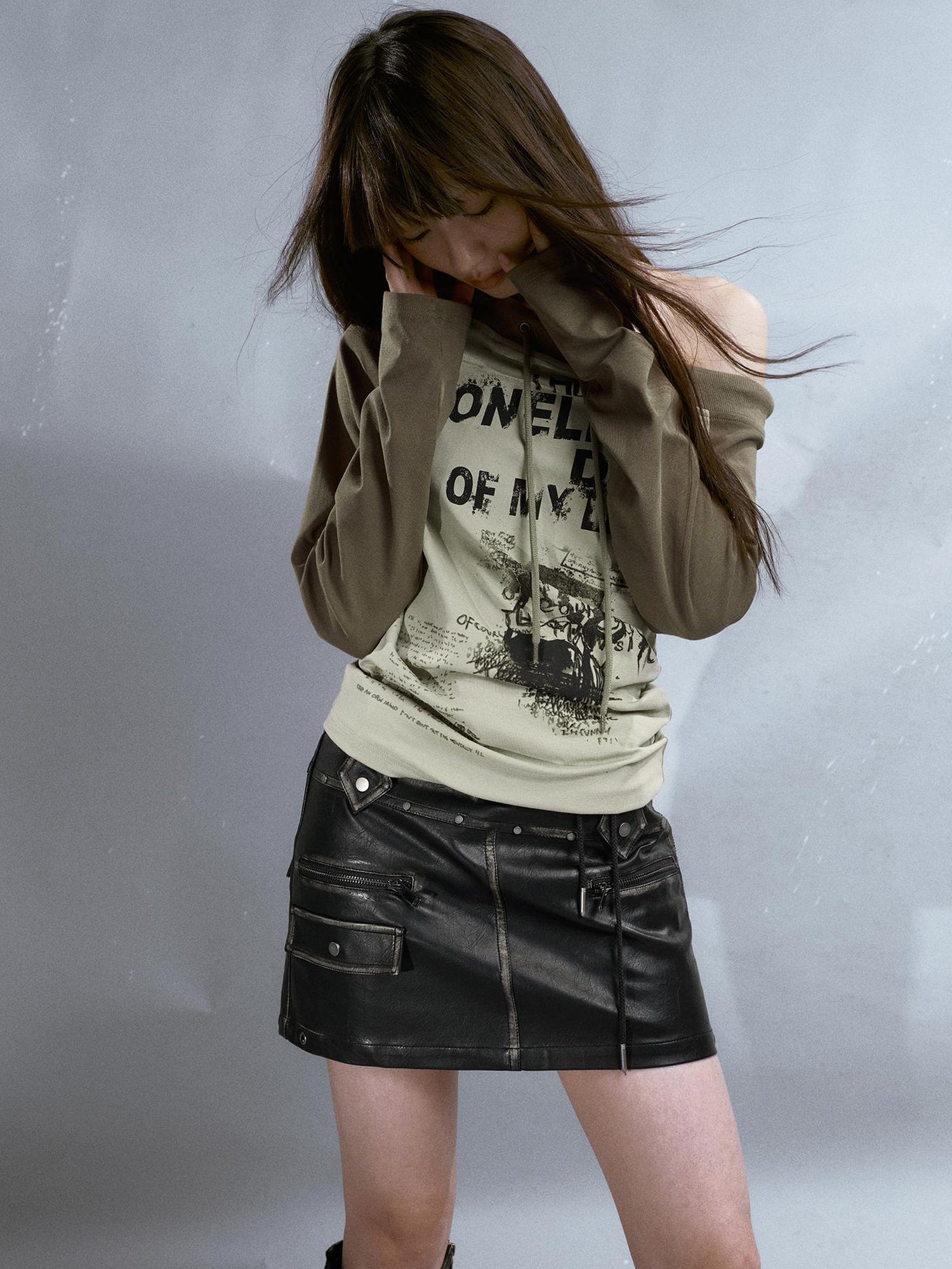 Cest Nous Run From Bad Love Asymmetrical Shoulder Graphic Knit Top