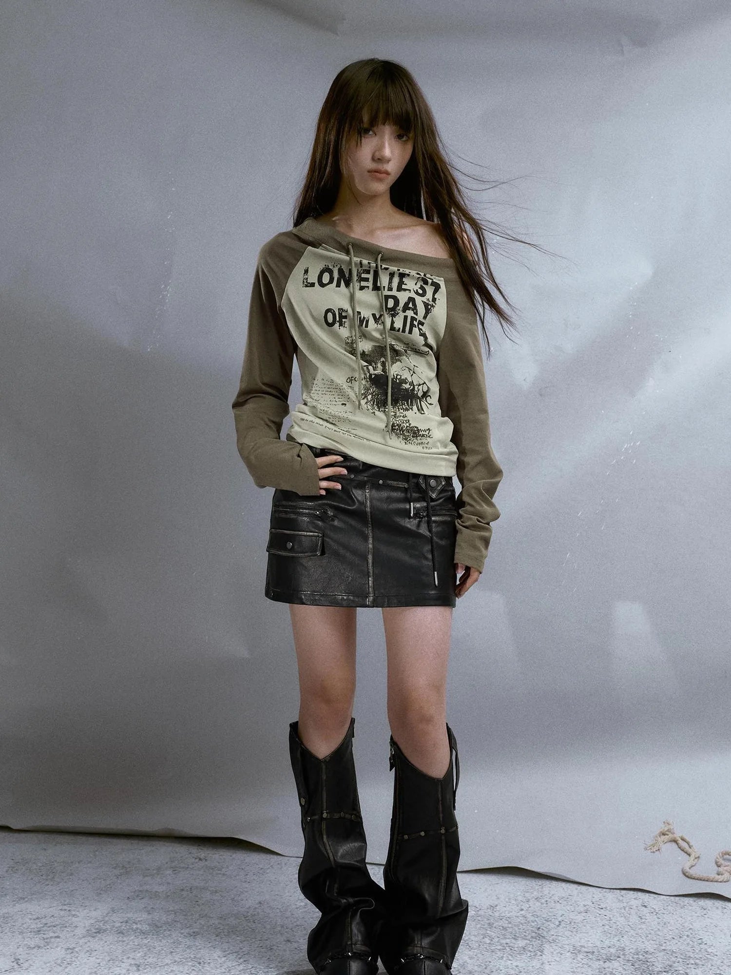 Run From Bad Love Asymmetrical Shoulder Graphic Knit Top