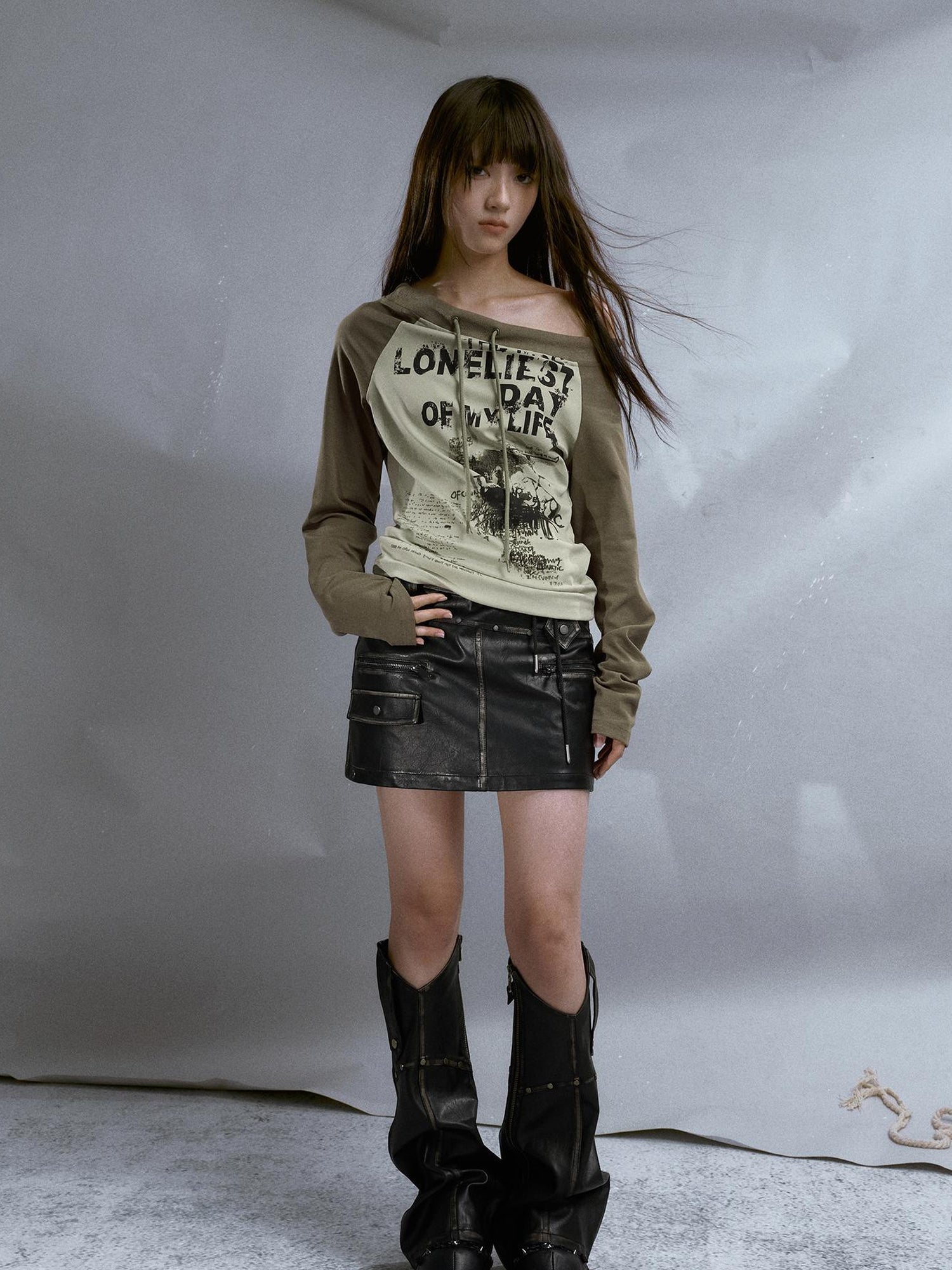 Cest Nous Run From Bad Love Asymmetrical Shoulder Graphic Knit Top