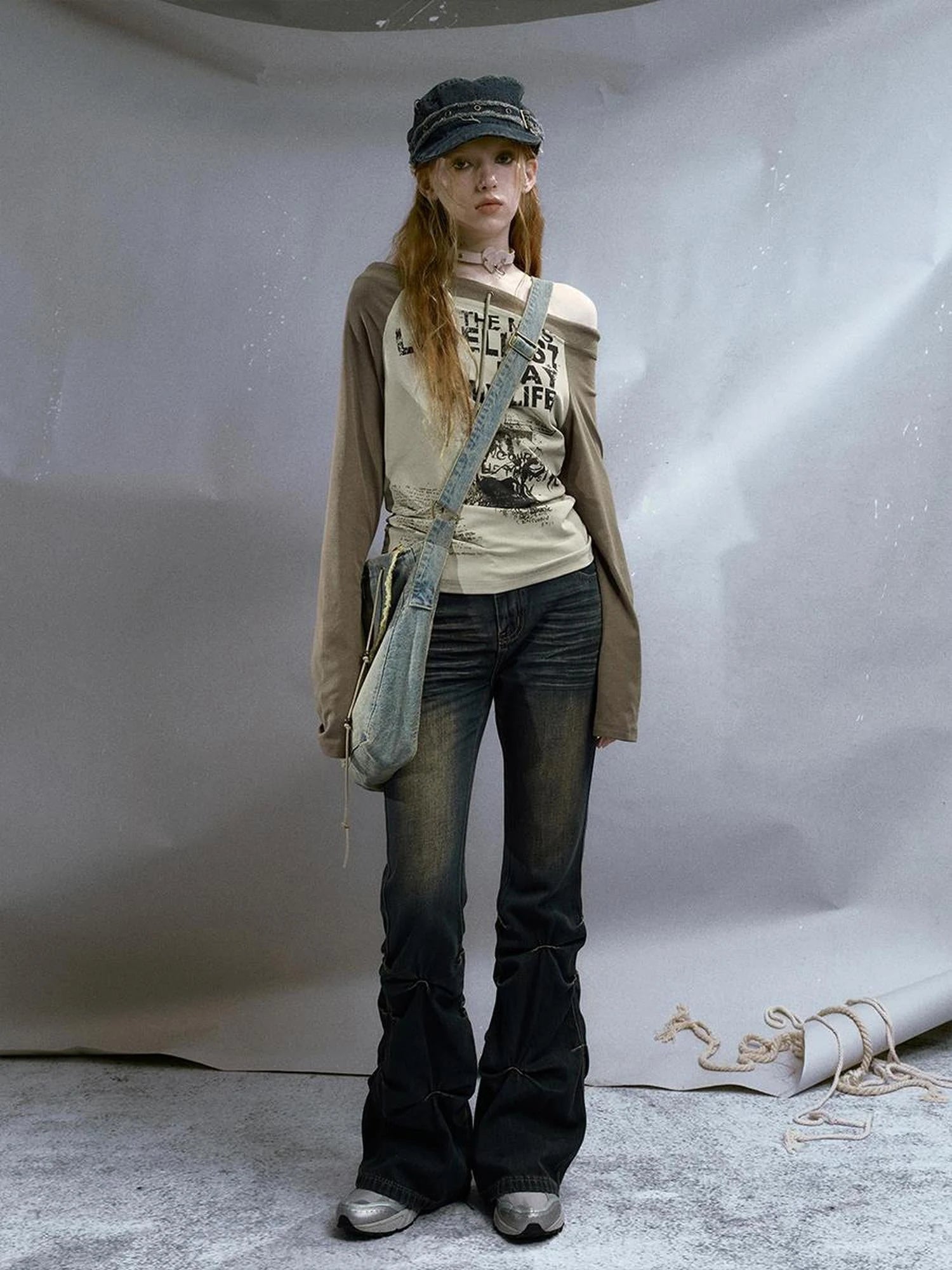 Run From Bad Love Asymmetrical Shoulder Graphic Knit Top