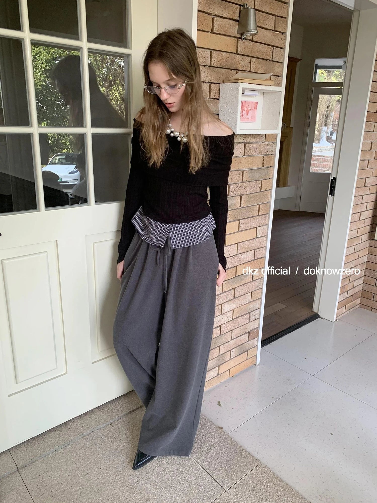 DKZ OFFICIAL Black Mock Neck Ribbed Knit Top With Hem Detail