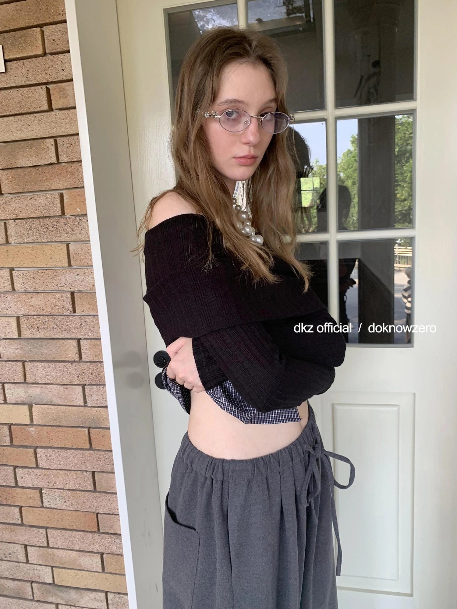 DKZ OFFICIAL Black Mock Neck Ribbed Knit Top With Hem Detail