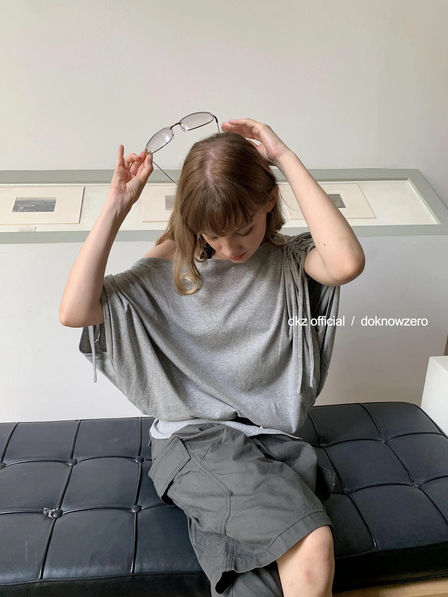 DKZ OFFICIAL Gray Batwing Sleeve T-shirt With Drawstring And Off-Shoulder Design