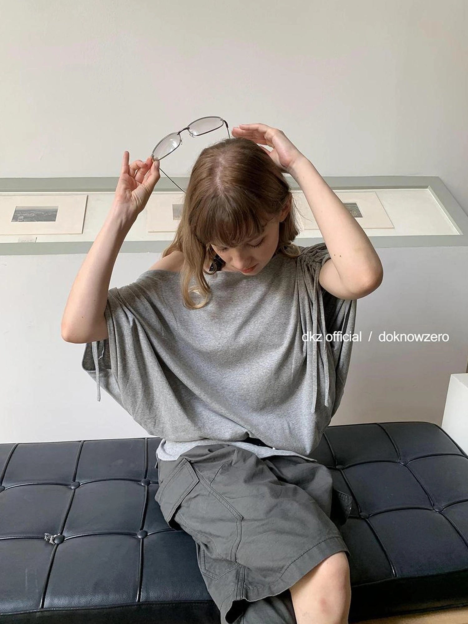 DKZ OFFICIAL Gray Batwing Sleeve T-shirt With Drawstring And Off-Shoulder Design