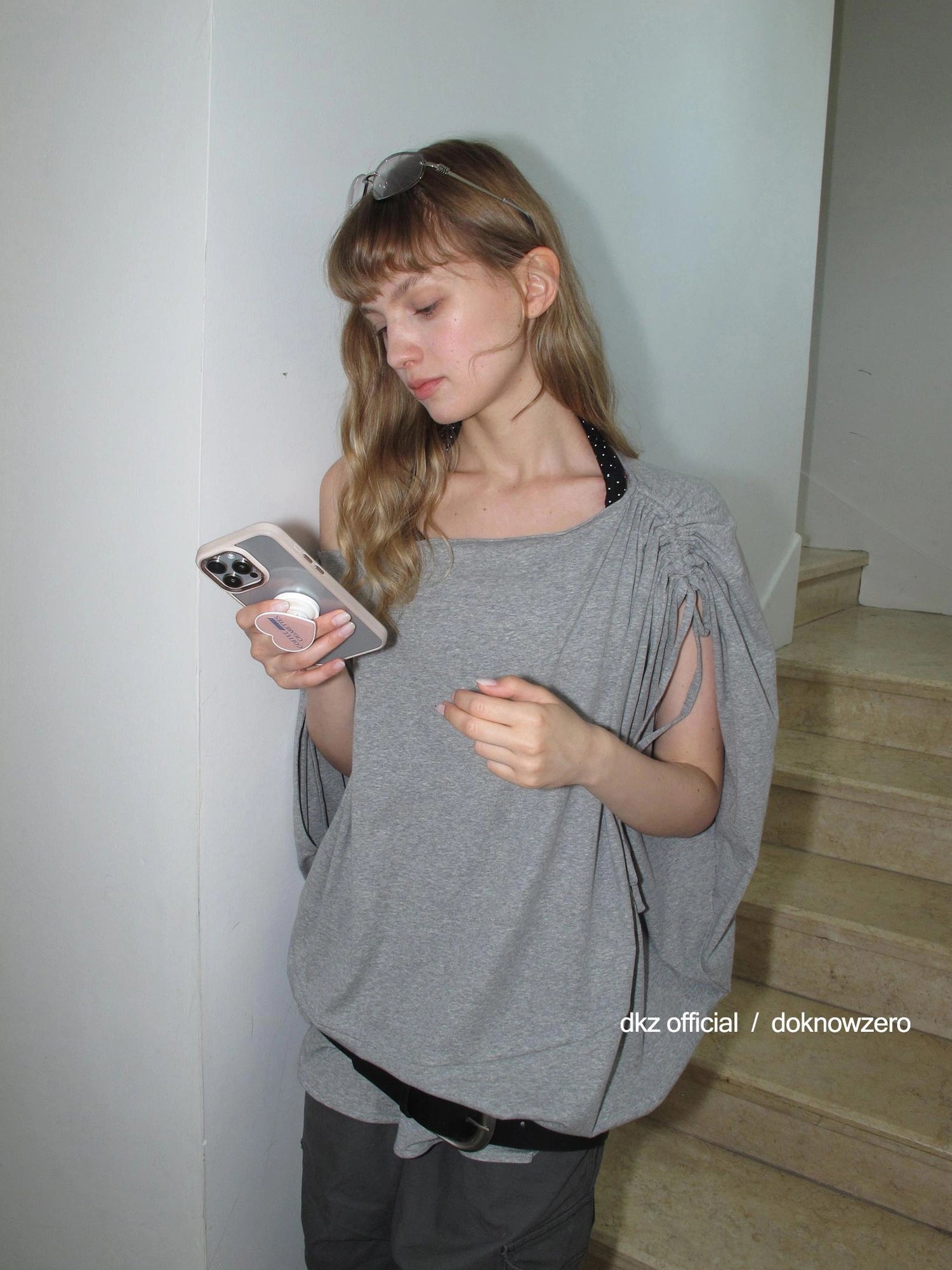 DKZ OFFICIAL Gray Batwing Sleeve T-shirt With Drawstring And Off-Shoulder Design