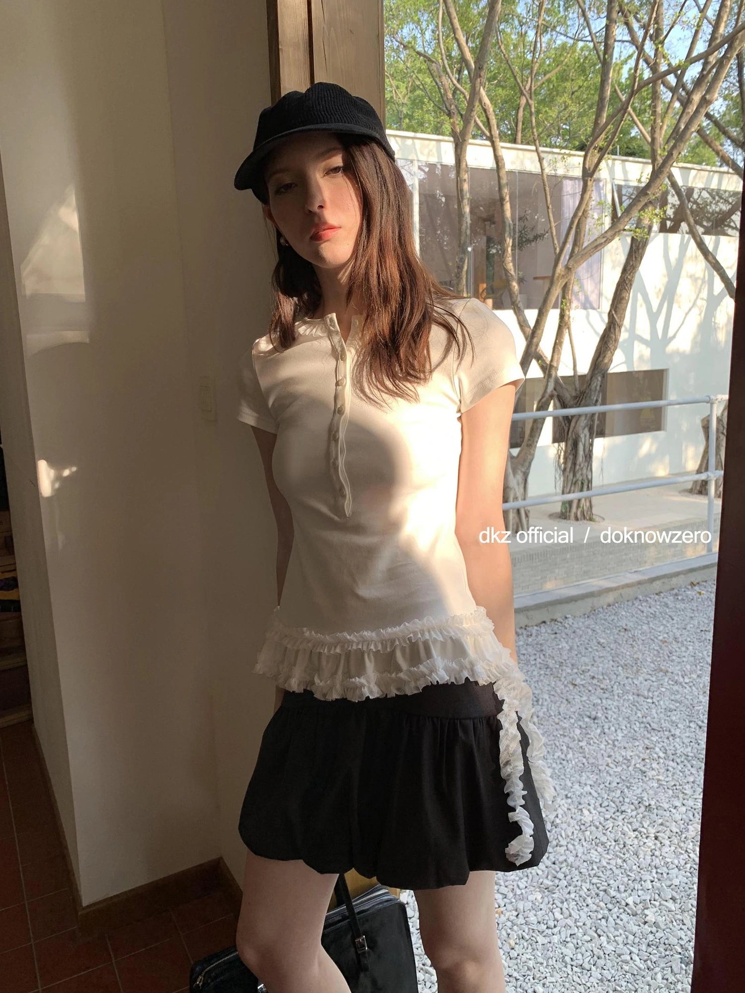 DKZ OFFICIAL Henry Collar Short Sleeve T-shirt With Hem Ruffle Design
