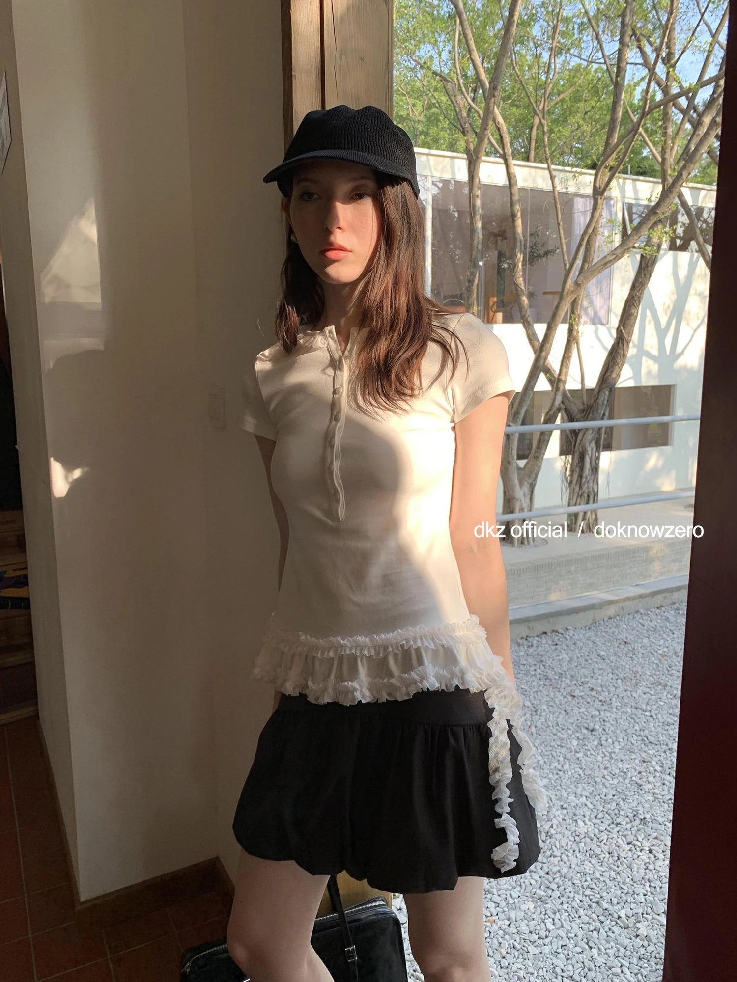 DKZ OFFICIAL Henry Collar Short Sleeve T-shirt With Hem Ruffle Design