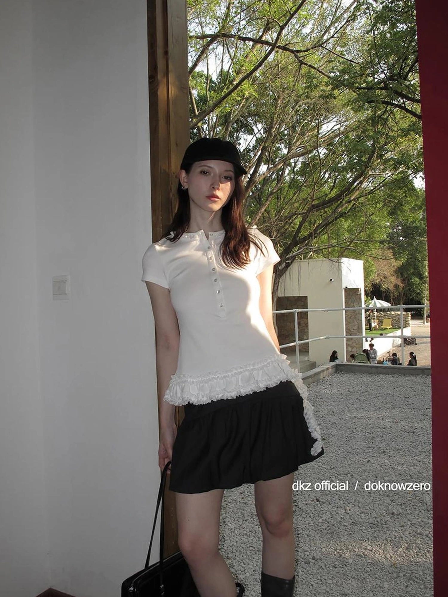 DKZ OFFICIAL Henry Collar Short Sleeve T-shirt With Hem Ruffle Design