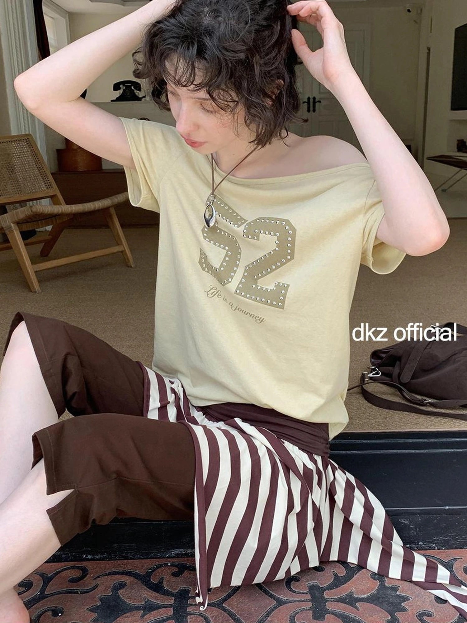 DKZ OFFICIAL Irregular Stripe Layering Skirt With Asymmetric Hem