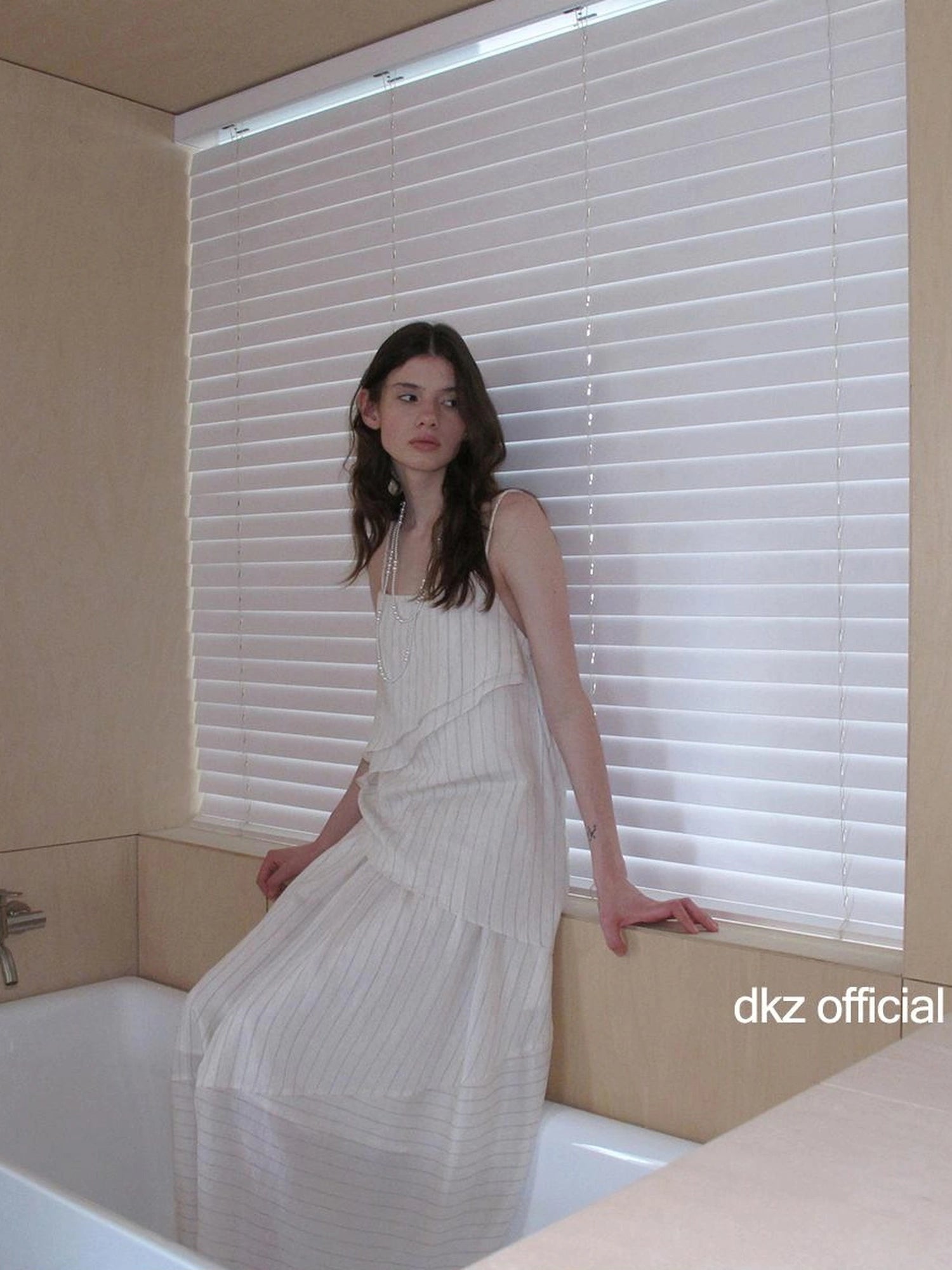 DKZ OFFICIAL Striped Irregular Camisole And Flounced Skirt Two Piece Set