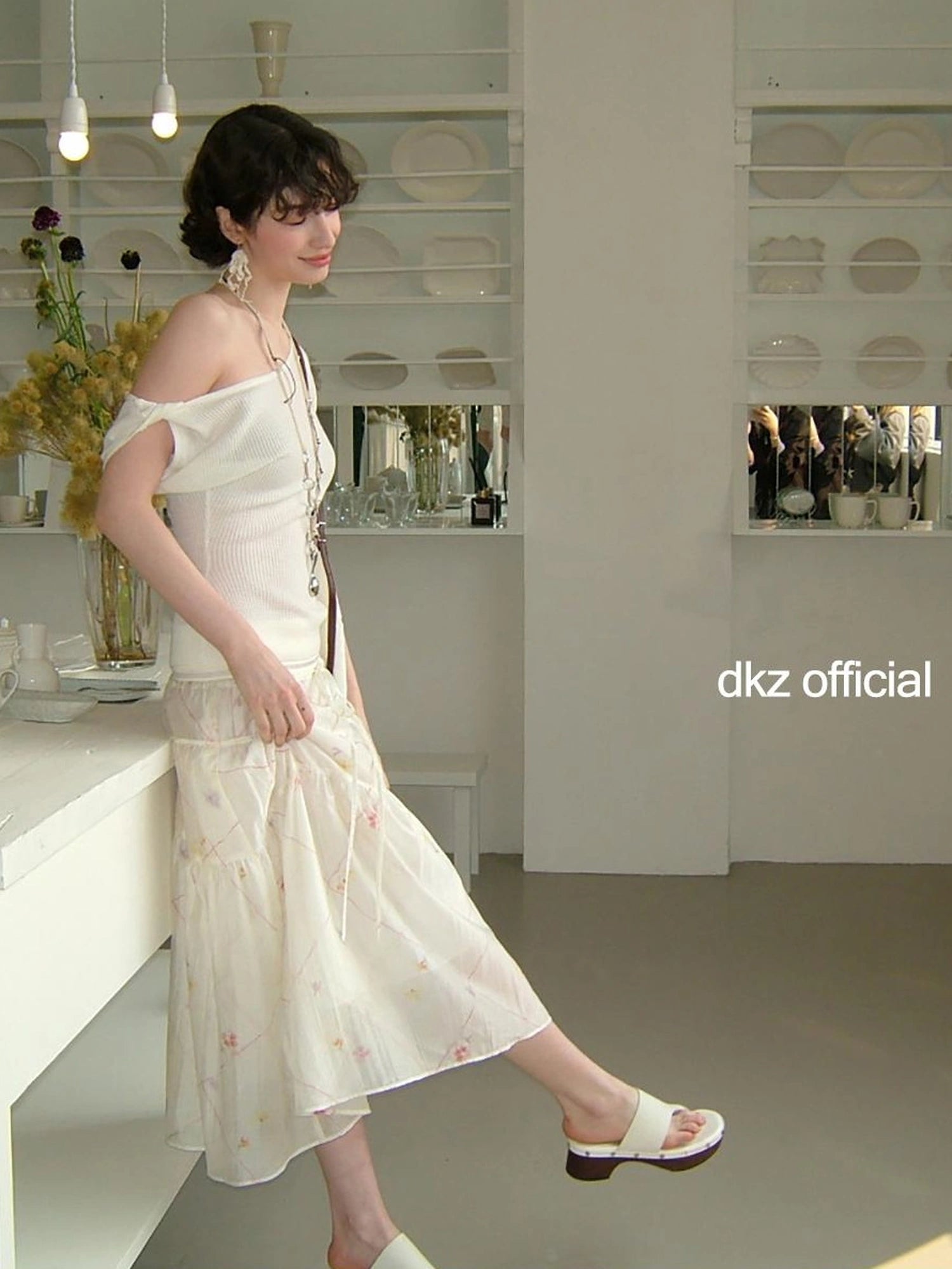 DKZ OFFICIAL Twisted Off Shoulder Knit Crop Top