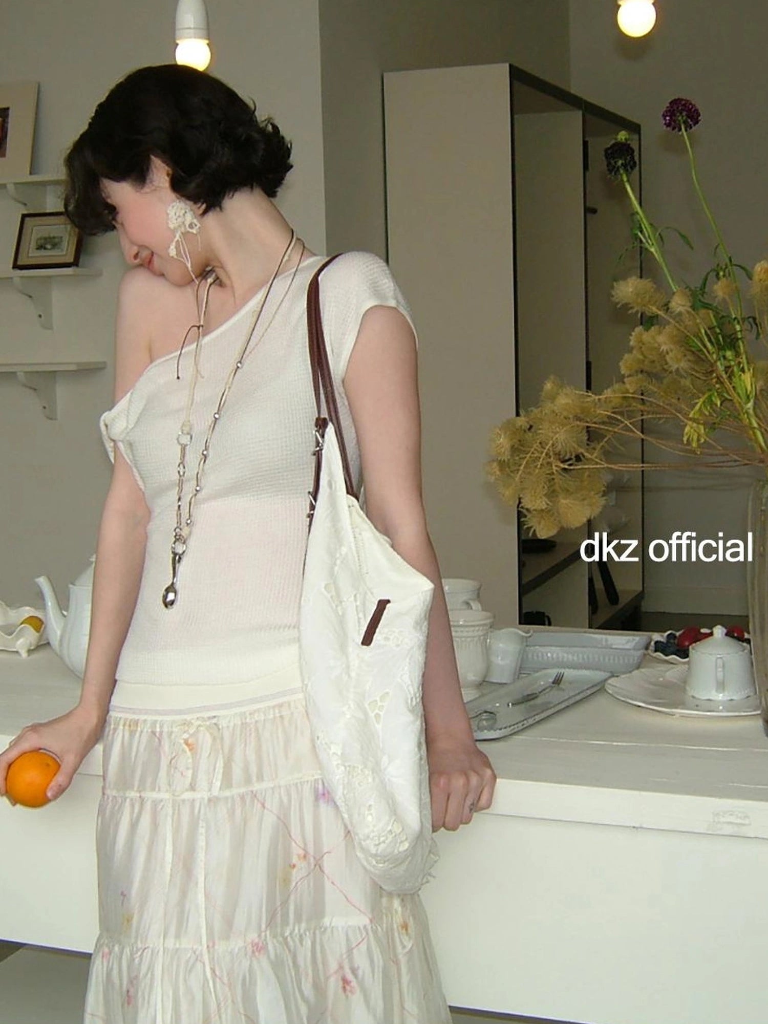 DKZ OFFICIAL Twisted Off Shoulder Knit Crop Top