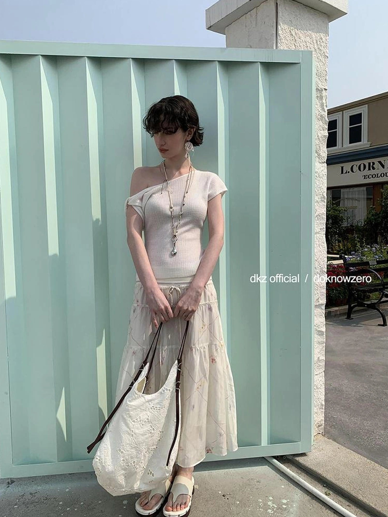 DKZ OFFICIAL Twisted Off Shoulder Knit Crop Top