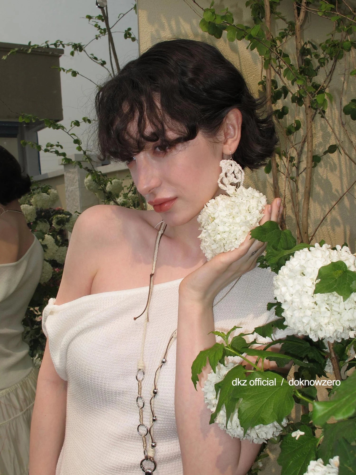 DKZ OFFICIAL Twisted Off Shoulder Knit Crop Top