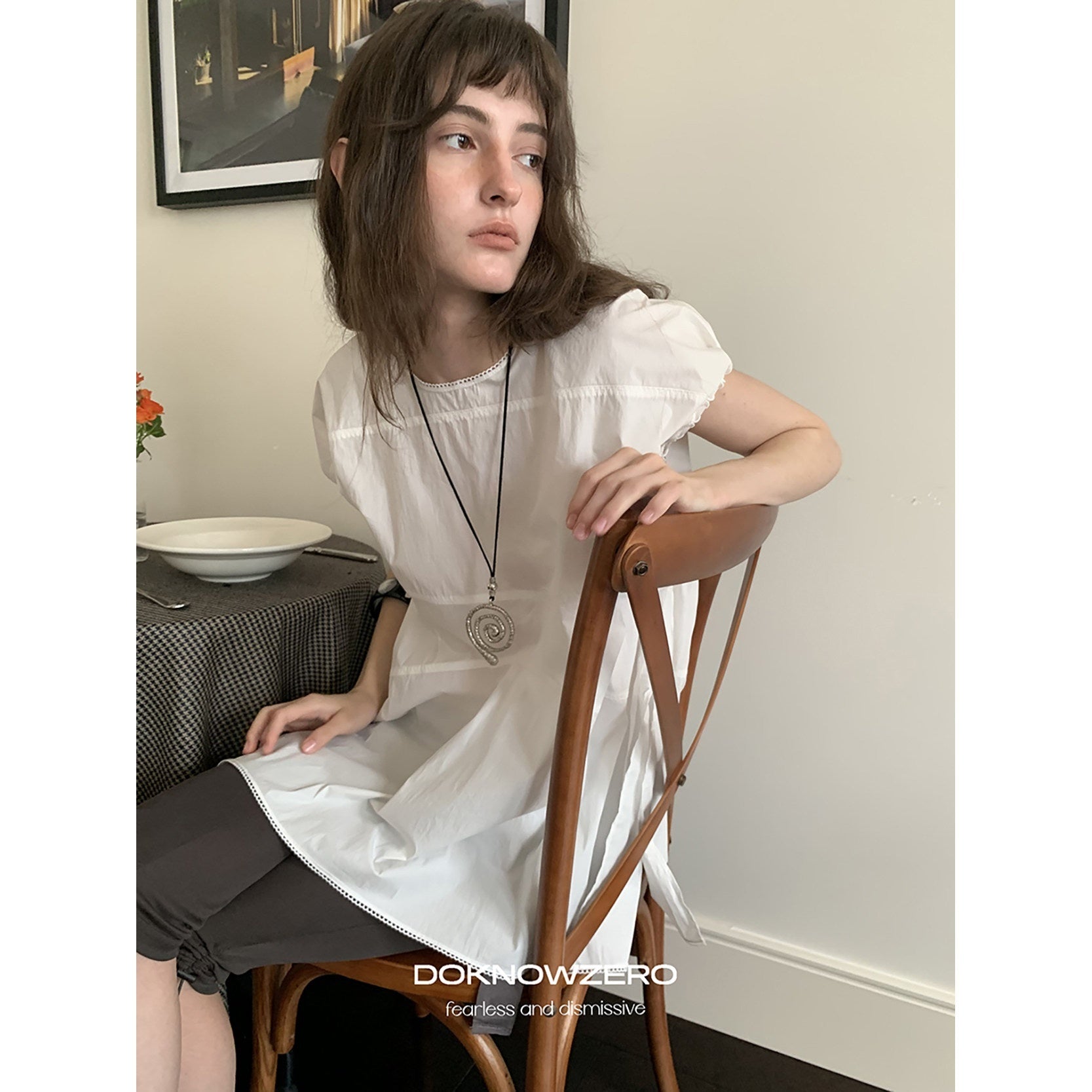 DKZ_OFFICIAL_White_Cap_Sleeve_Round_Neck_Loose_Fit_Women&