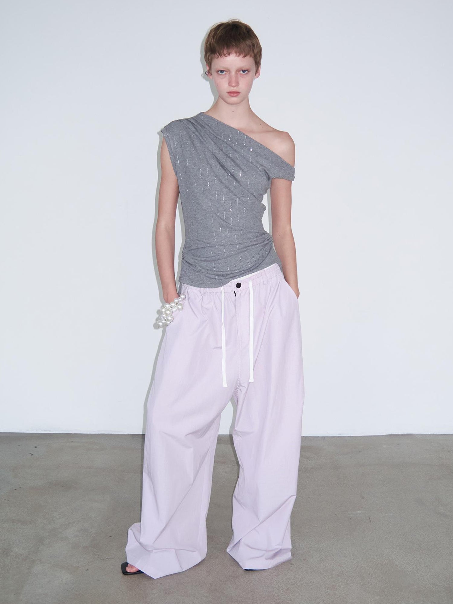 Delivery Asymmetric Shoulder Ruffle Top With Drawstring And Metallic Detail