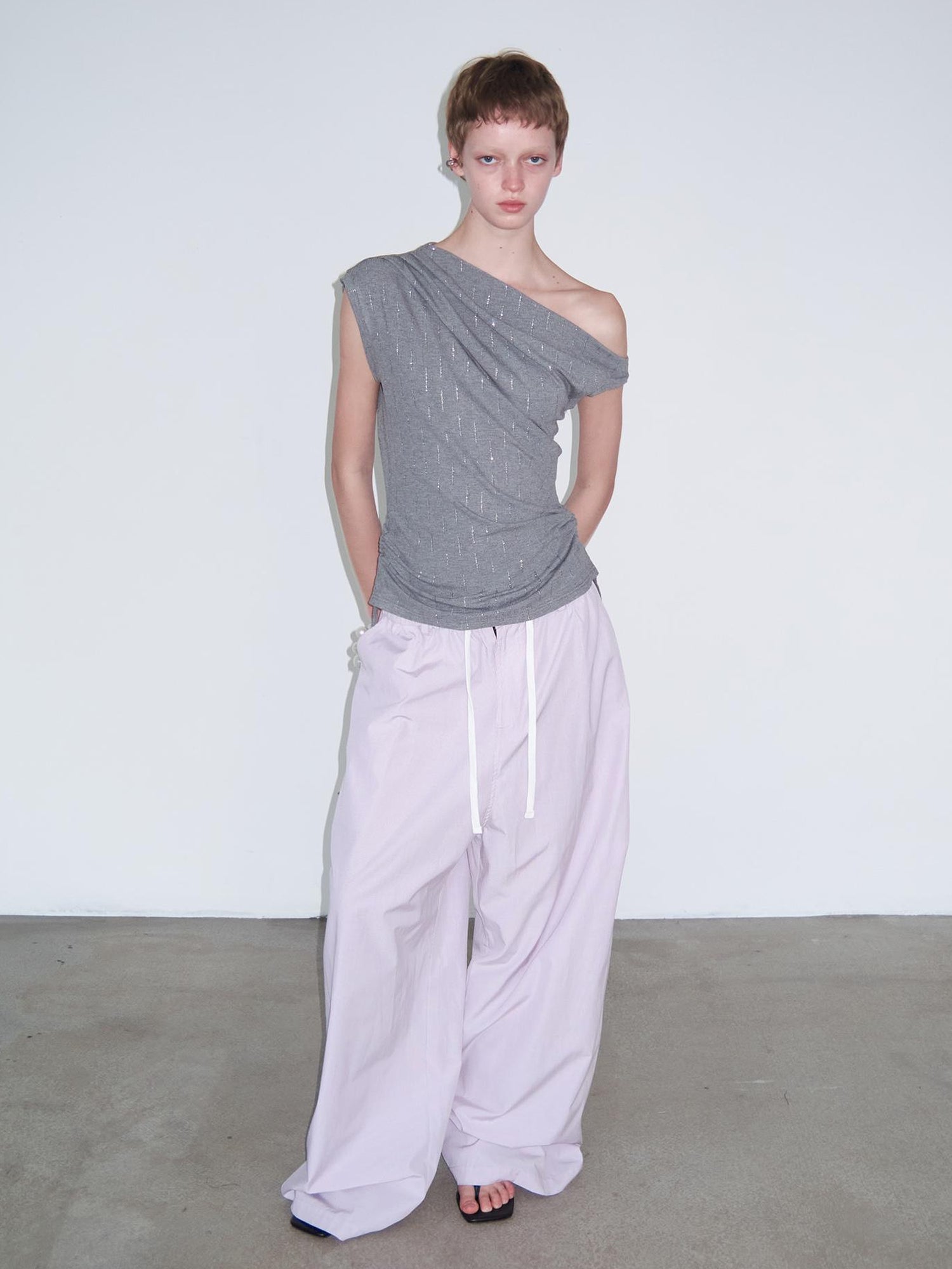 Delivery Asymmetric Shoulder Ruffle Top With Drawstring And Metallic Detail