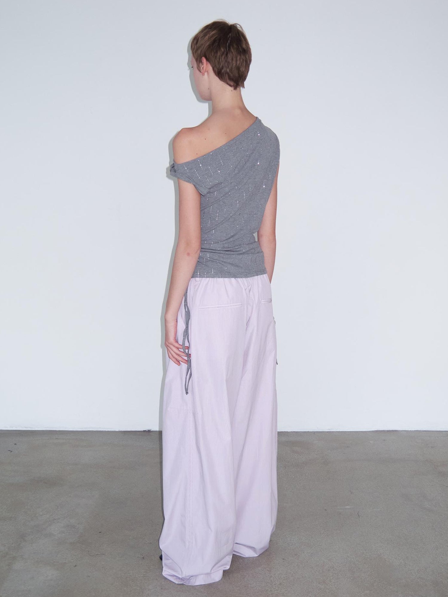 Delivery Asymmetric Shoulder Ruffle Top With Drawstring And Metallic Detail