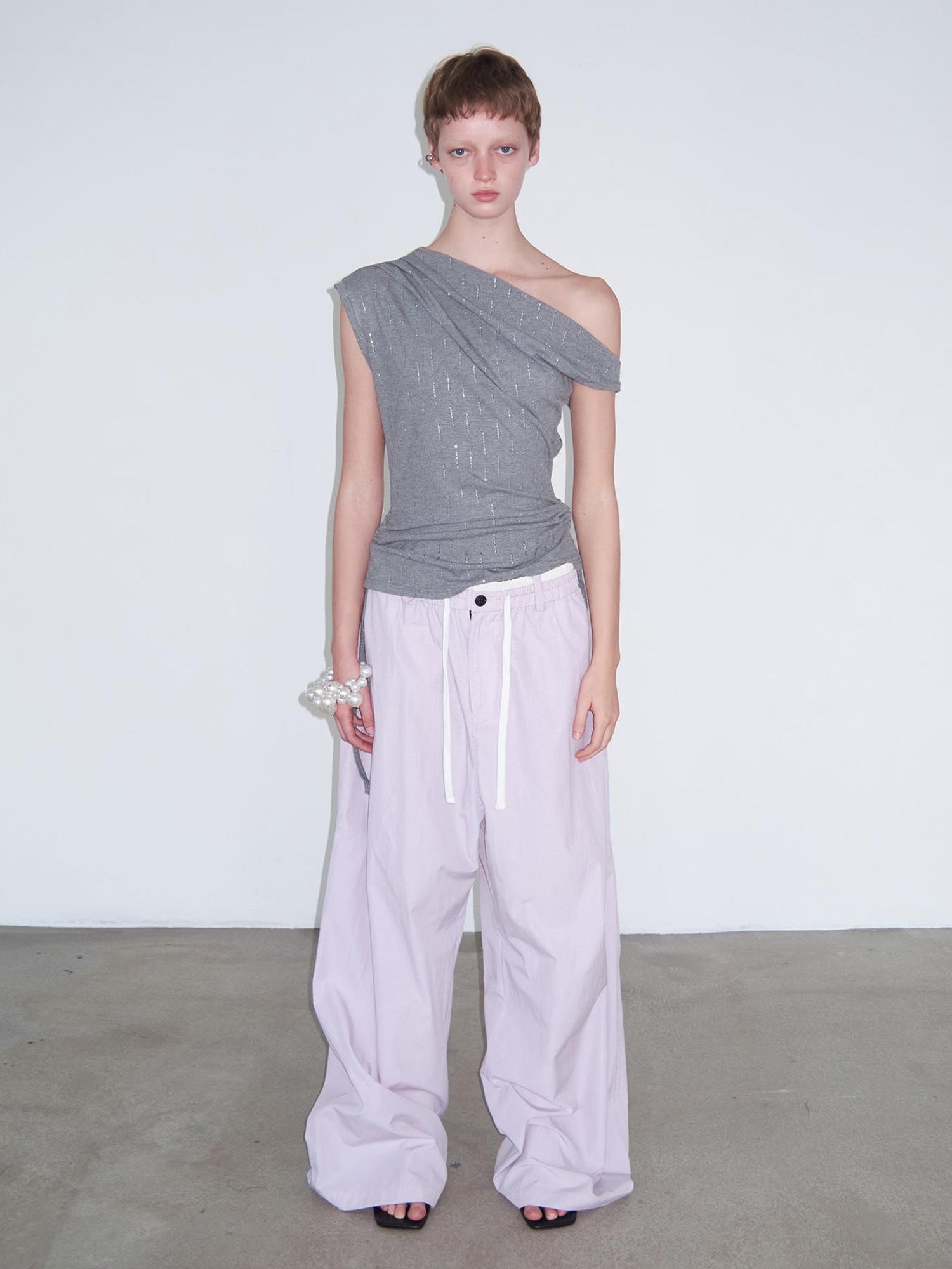 Delivery Asymmetric Shoulder Ruffle Top With Drawstring And Metallic Detail