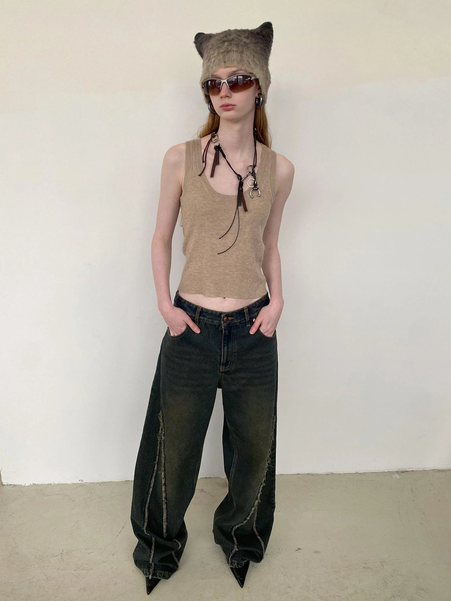 Distressed Washed Blue Denim Jeans With Frayed Hem