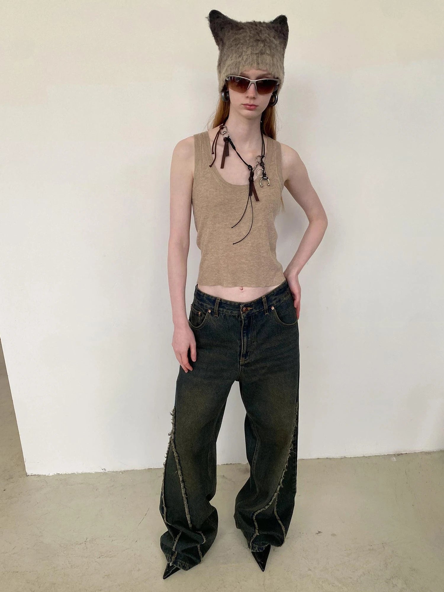 Distressed Washed Blue Denim Jeans With Frayed Hem