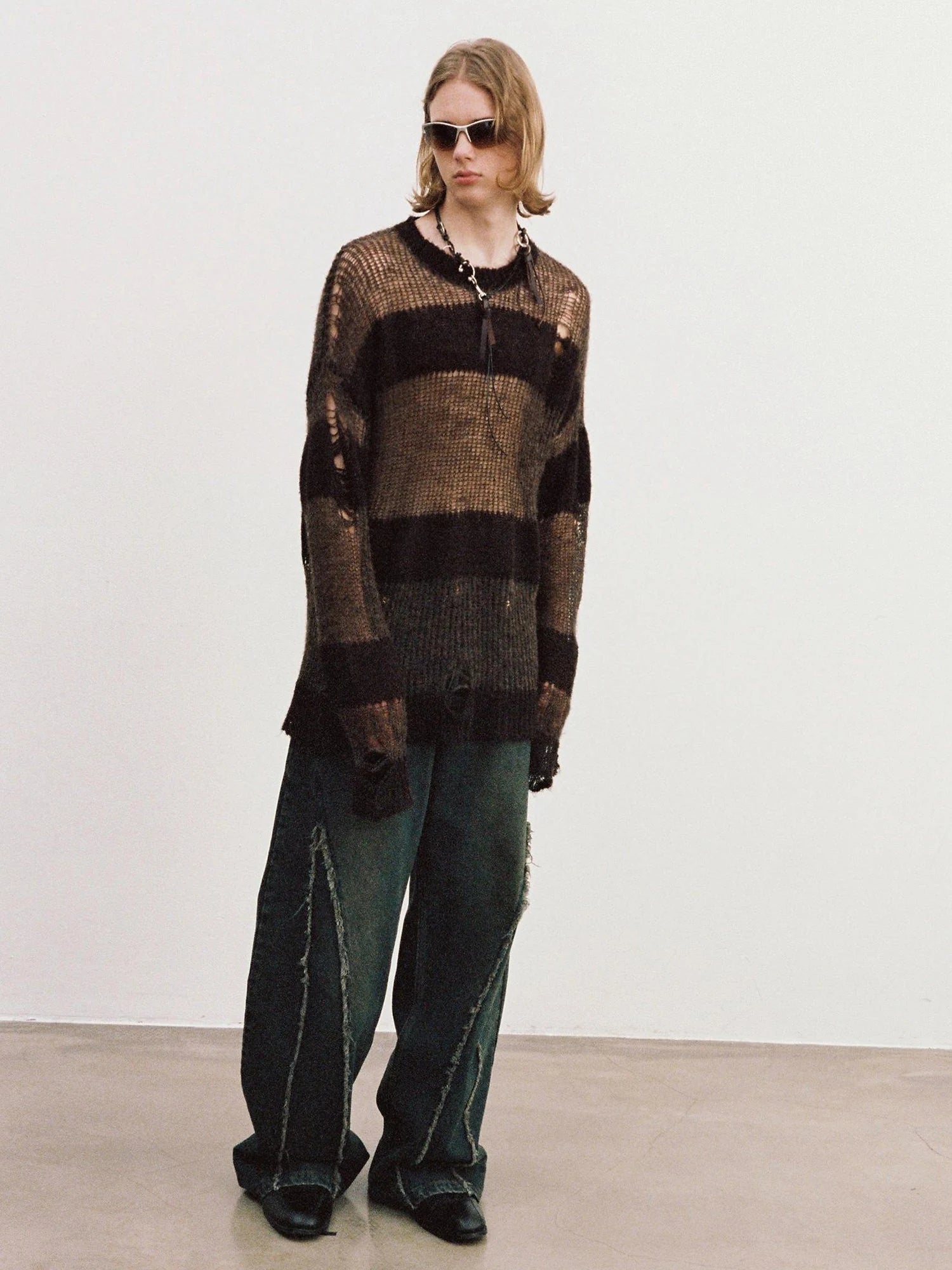 Distressed Washed Blue Denim Jeans With Frayed Hem